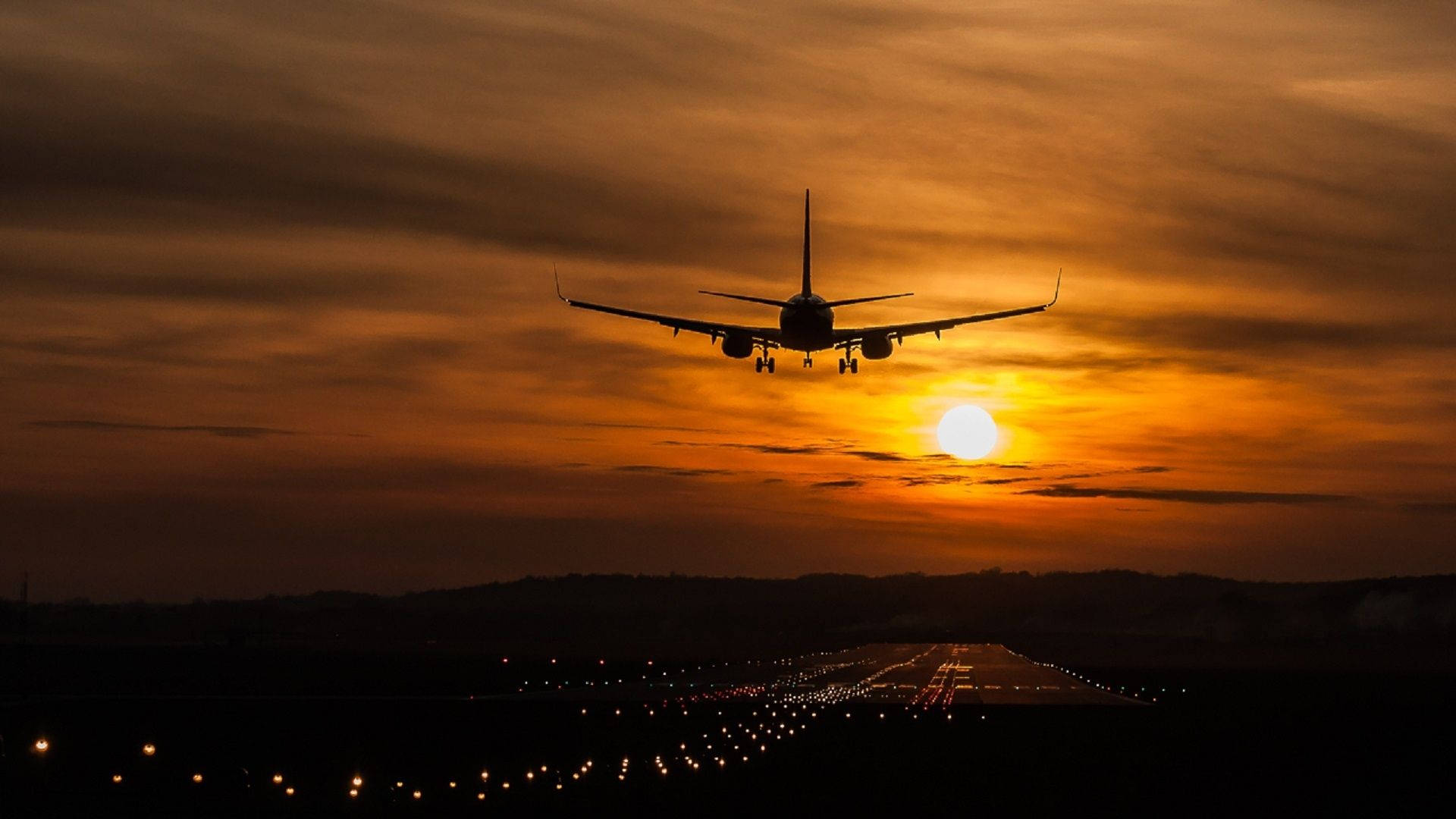 Aircraft Over The Runway At Dawn