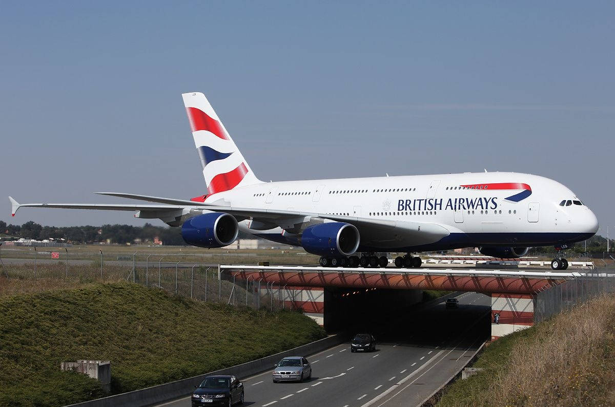 Airplane From British Airways Over Road Tunnel Background