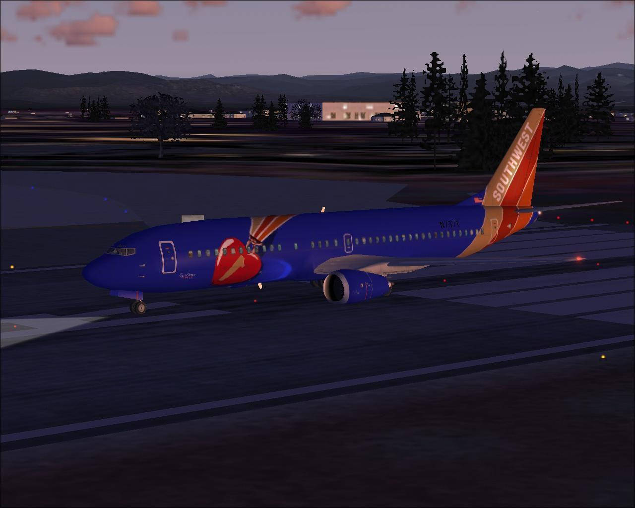 Airplane On Runway Southwest Airlines Background