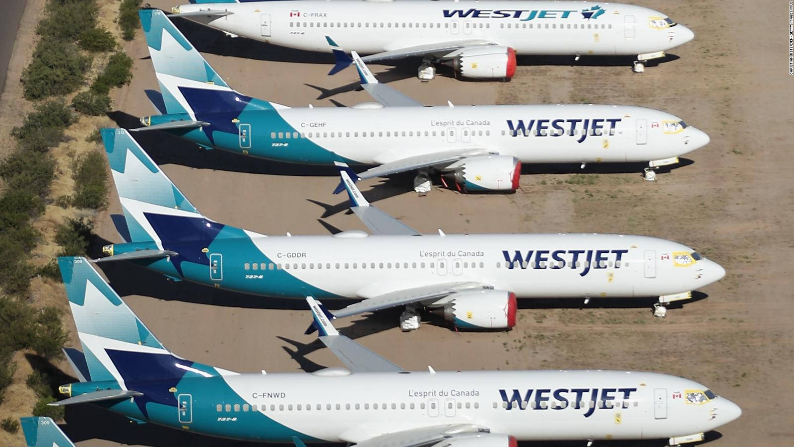 Airplanes Of Westjet Airline At Parking Ramp