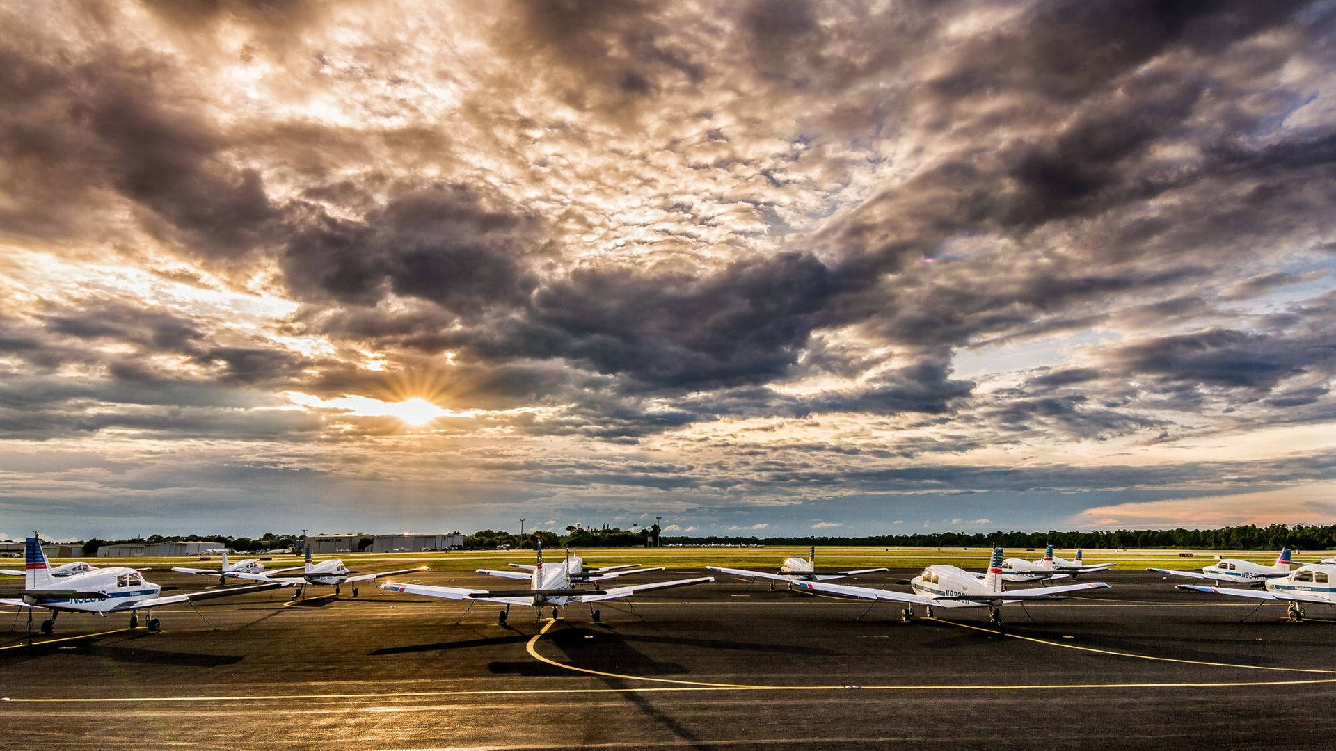 Airplanes Parked On Runway Background