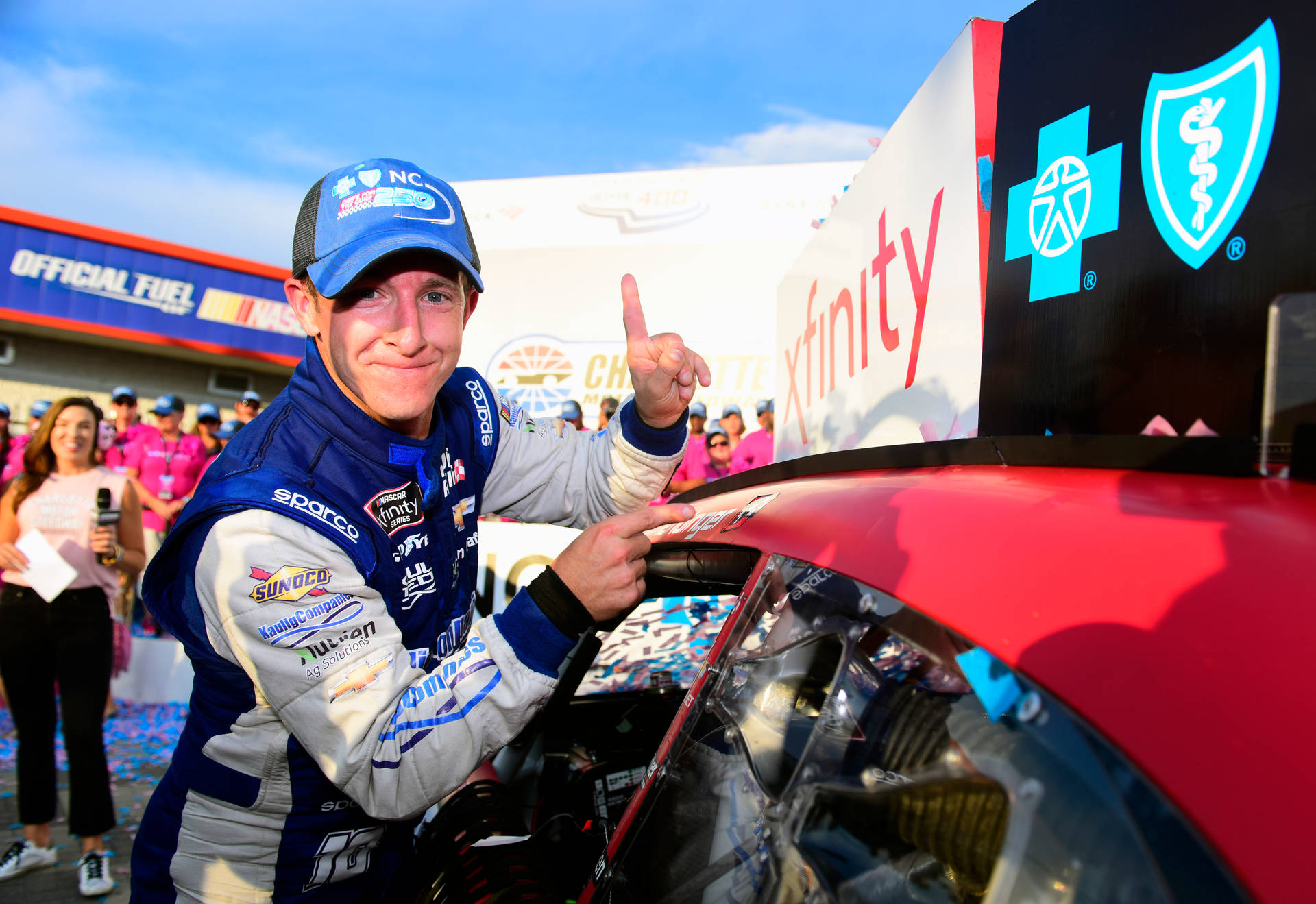 Aj Allmendinger Celebrates A Victory Background