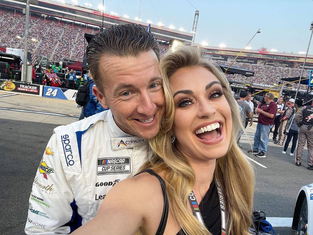 Aj Allmendinger With Smiling Wife Background