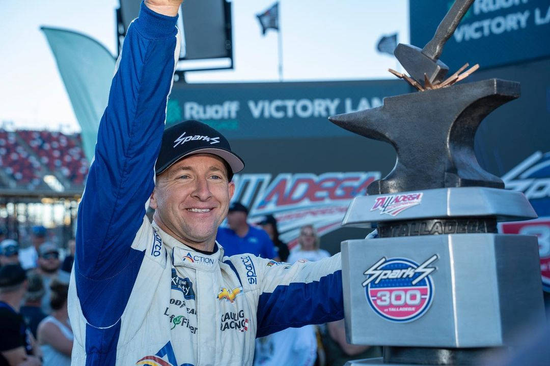 Aj Allmendinger With Trophy Background