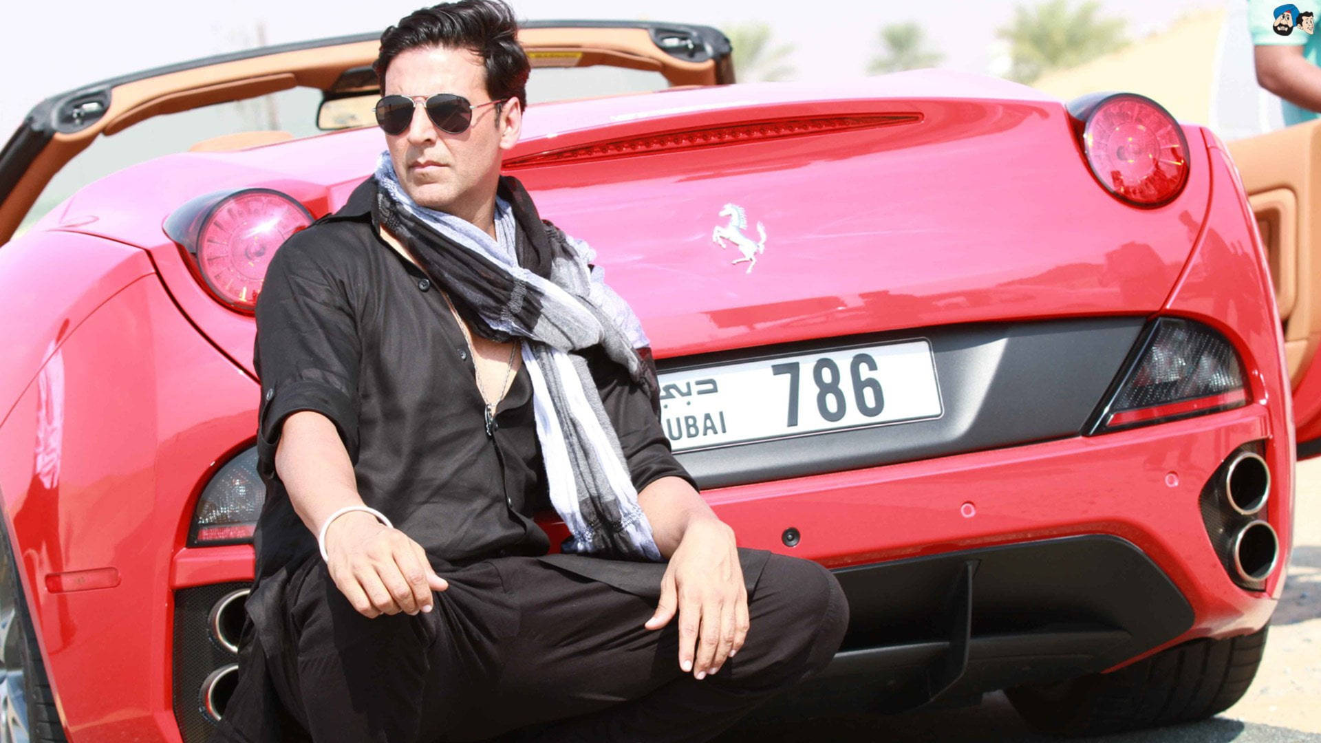 Akshay Kumar With Red Ferrari Car Background