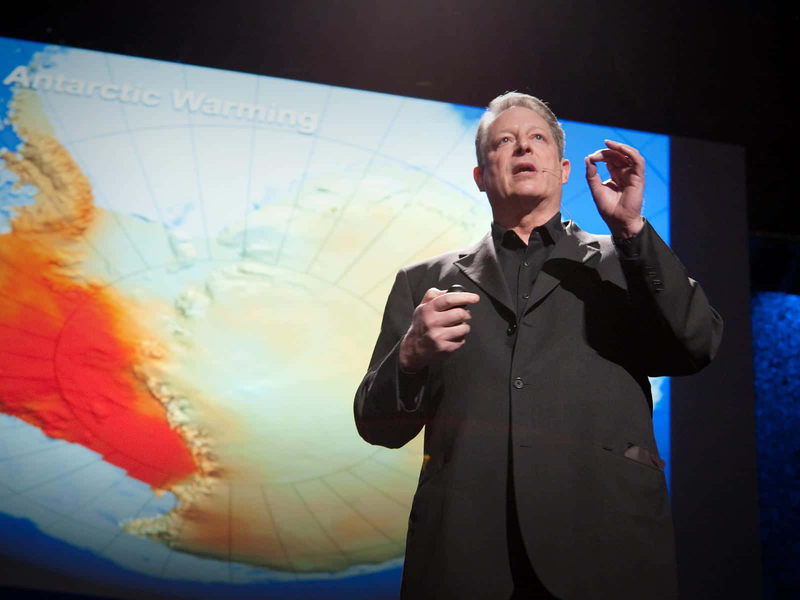 Al Gore Delivers A Talk On Stage Background