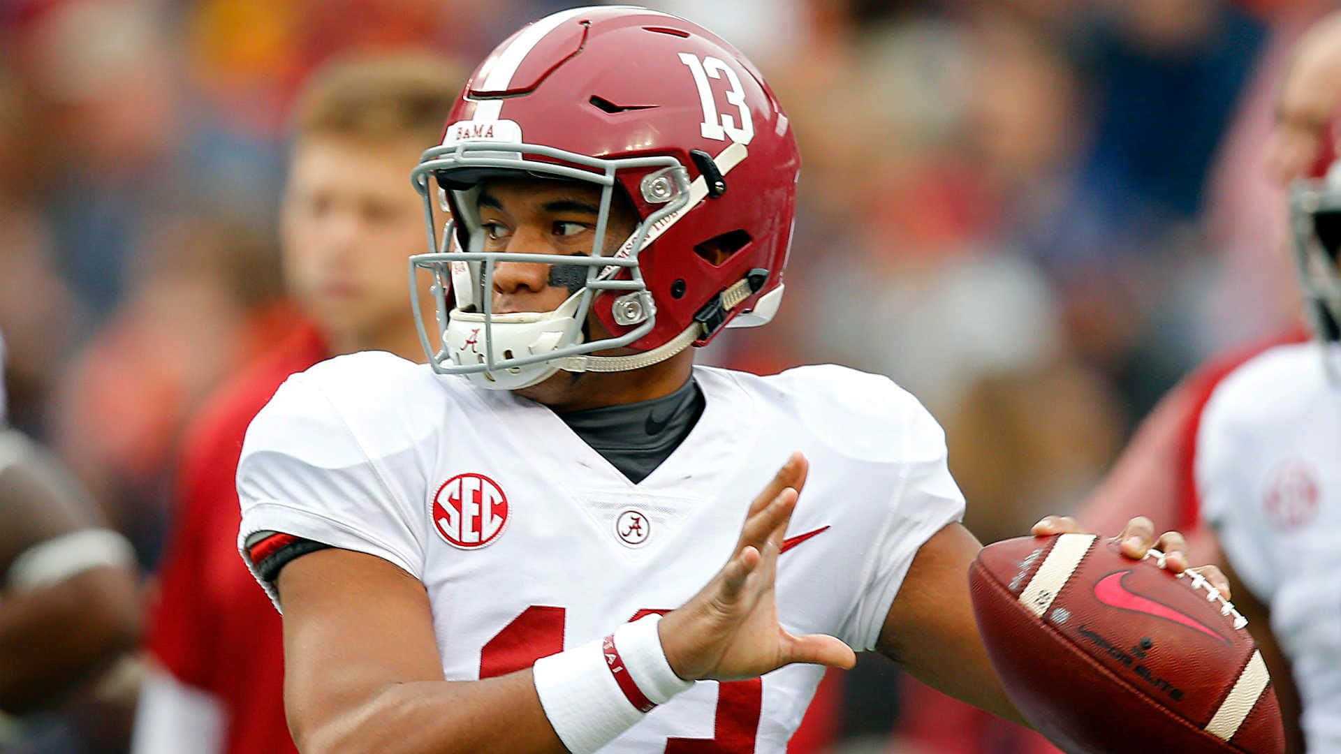 Alabama Crimson Tide Quarterback Tua Tagovailoa Leading His Team To Victory! Background