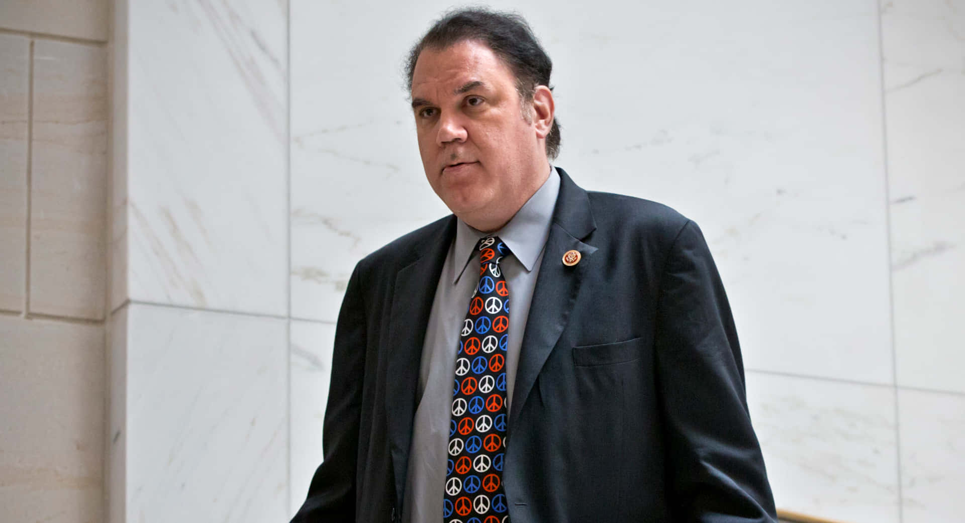 Alan Grayson Serious Face Look Background