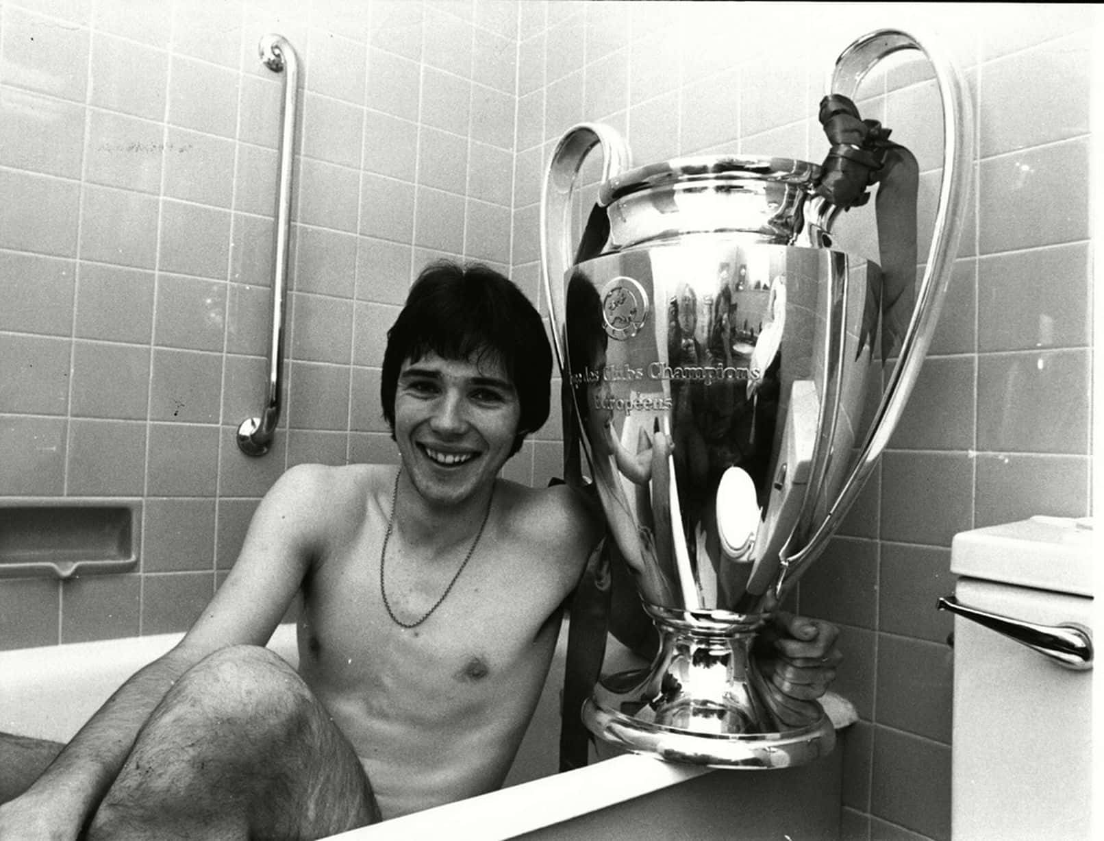 Alan Hansen Holding The 1978 European Cup In A Bathtub Background