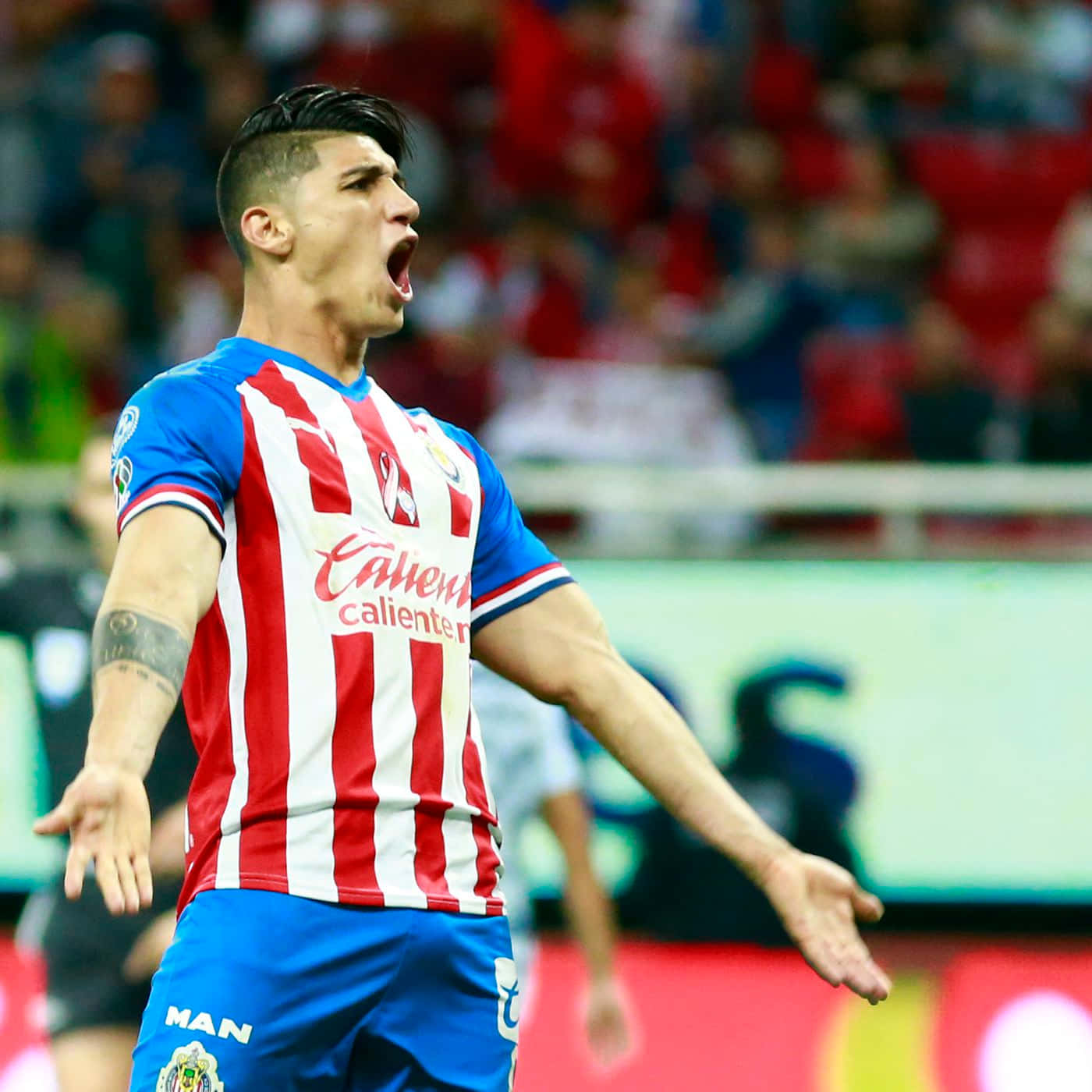 Alan Pulido In Action During His Guadalajara Football Days. Background