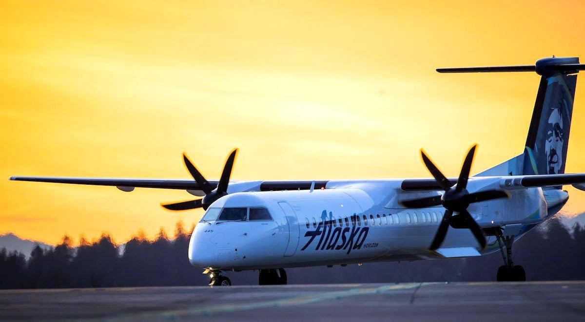 Alaska Airlines Aircraft With Propellers Background