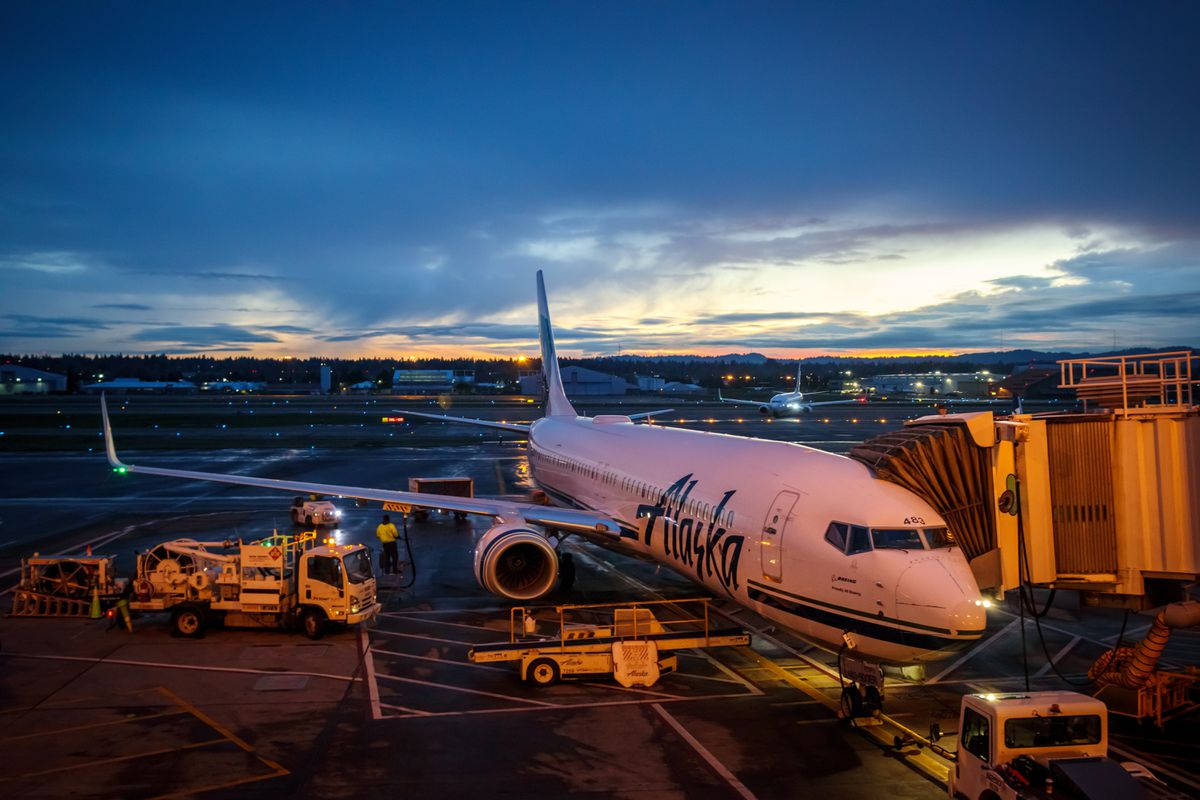 Alaska Airlines Parked Airplane Background