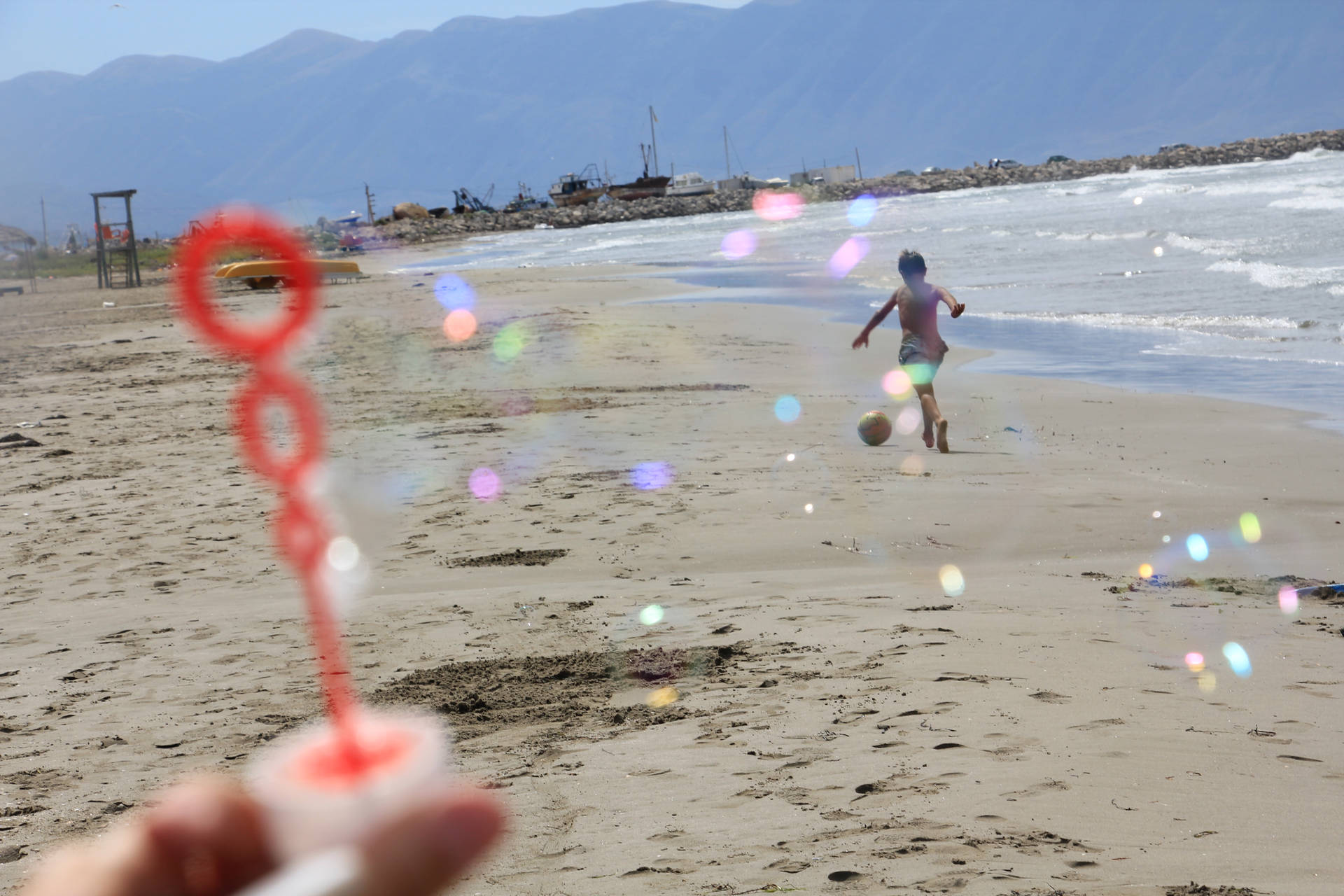Albania Bubbles On Beach Background