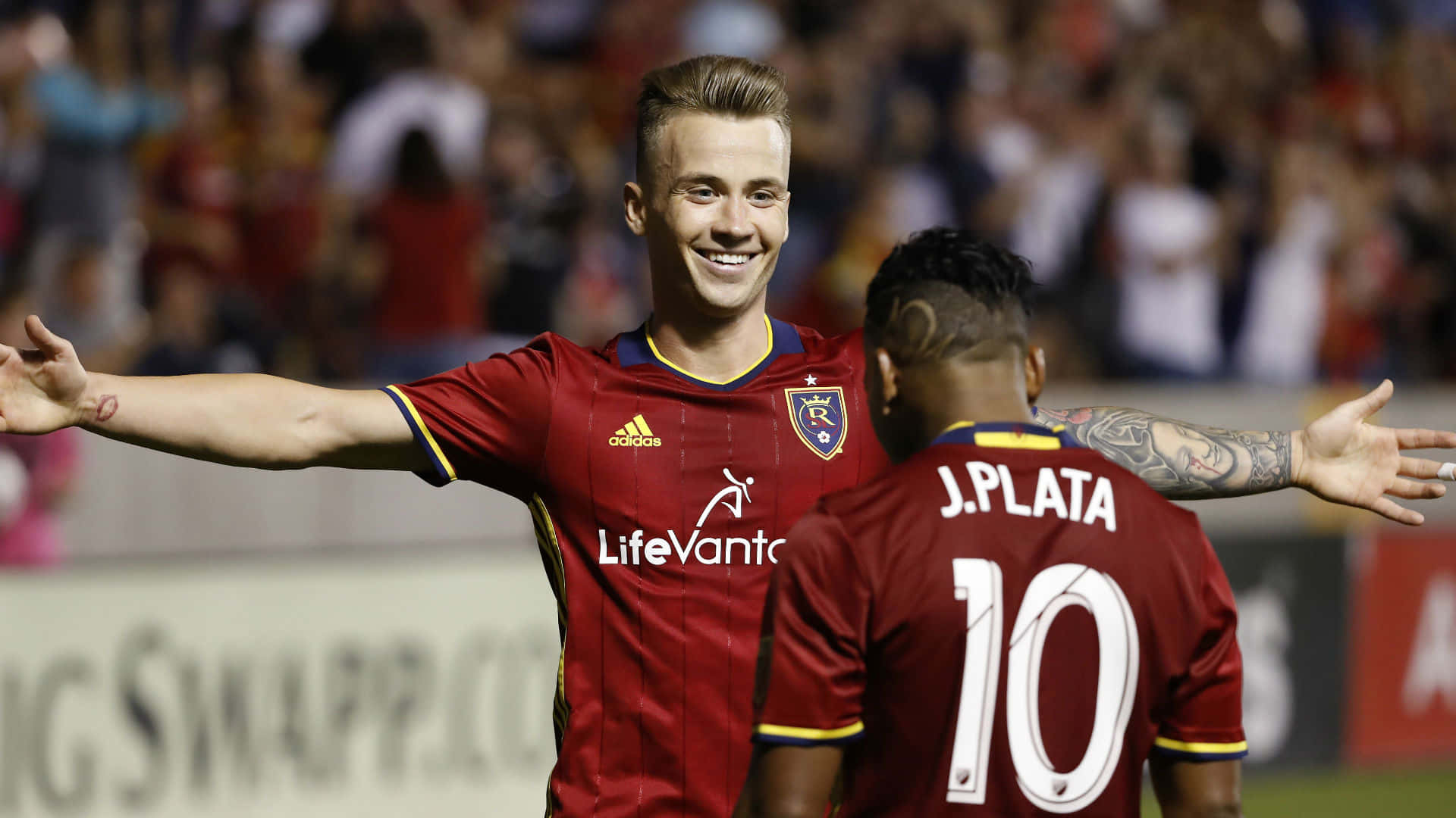 Albert Rusnak Waiting To Hug Joao Plata Background