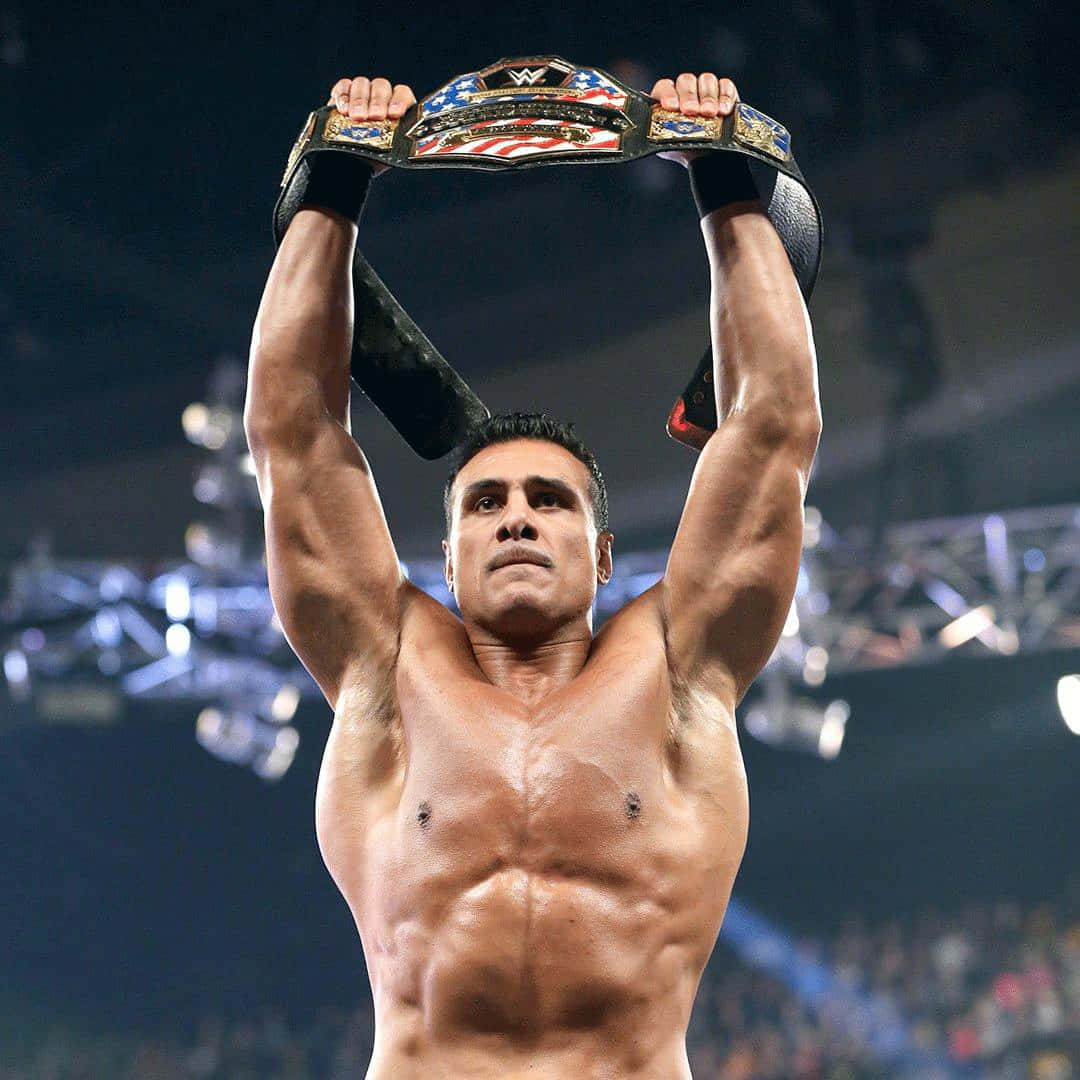 Alberto Del Rio Raising Championship Belt Background