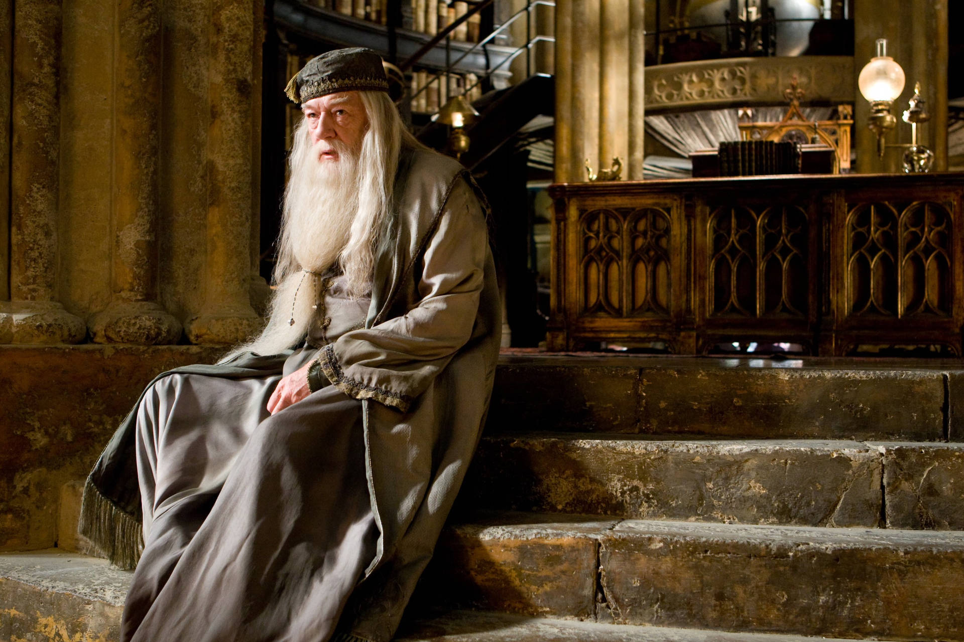 Albus Dumbledore Sitting Near The Altar Background