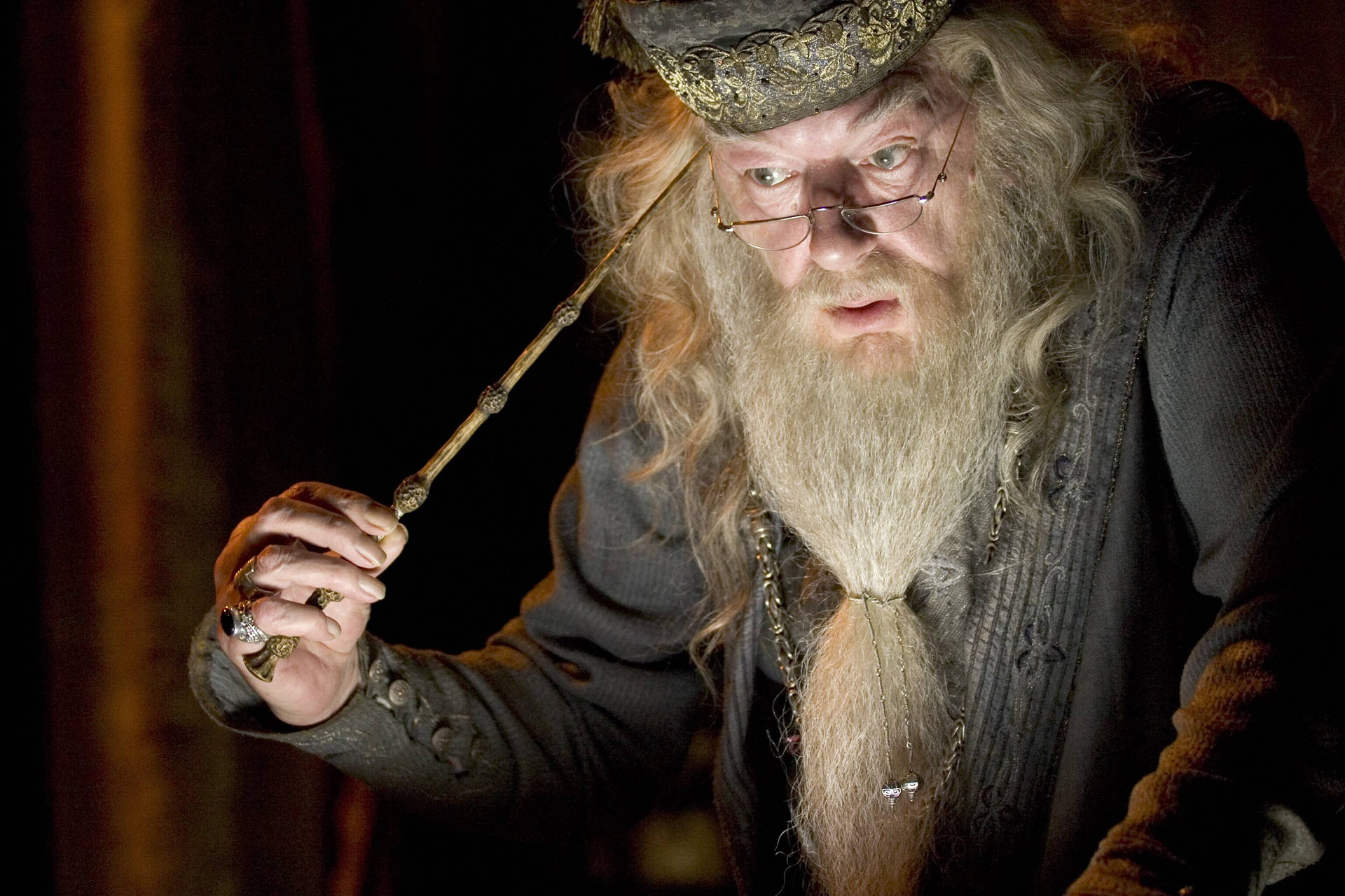 Albus Dumbledore With A Wand Background