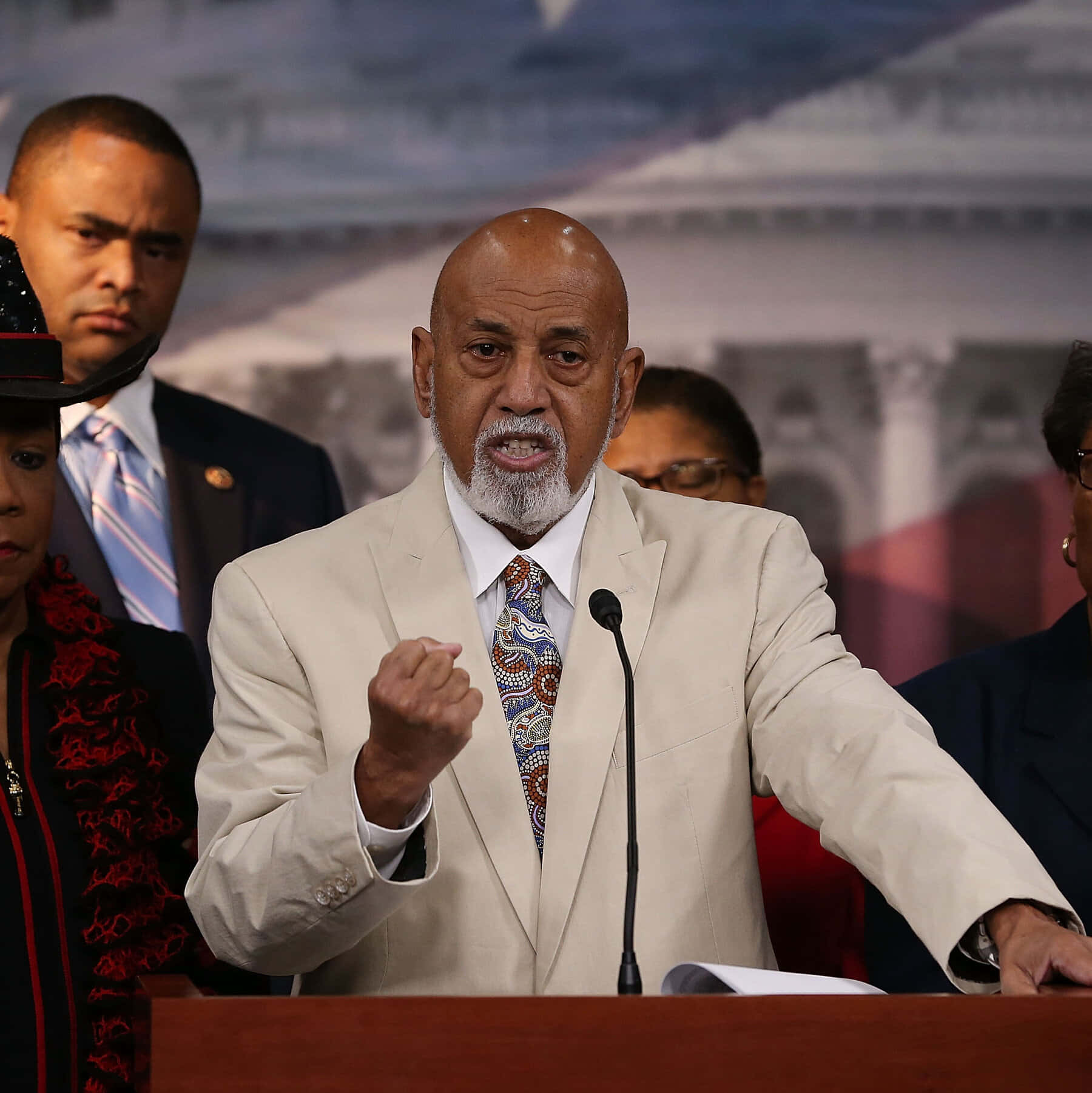 Alcee Hastings Celebrates With A Fist Pump Background