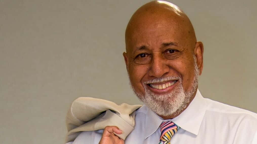 Alcee Hastings Coat Over His Shoulder Background