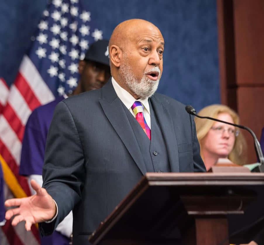 Alcee Hastings Delivering An Influential Speech Background