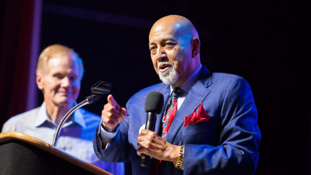 Alcee Hastings Giving A Talk Background