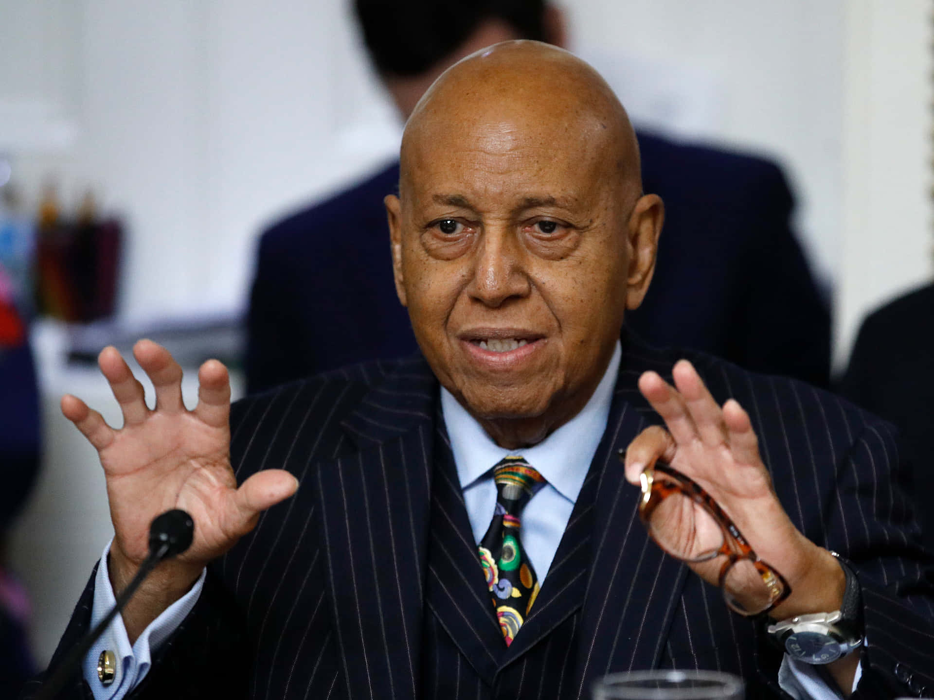 Alcee Hastings Hand Gestures Background