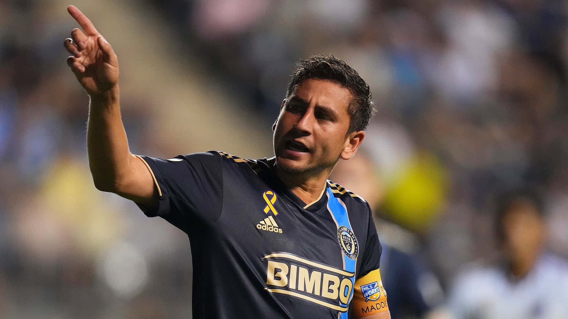 Alejandro Bedoya Pointing Hand Background