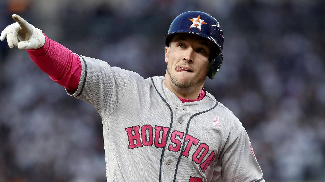 Alex Bregman Pointing With Tongue Out Background