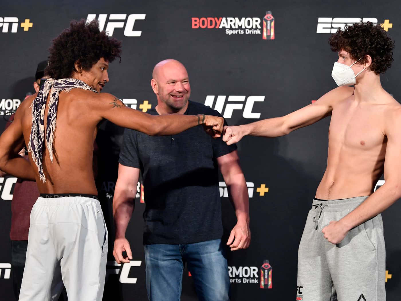 Alex Caceres Fist Bump Chase Hooper Background