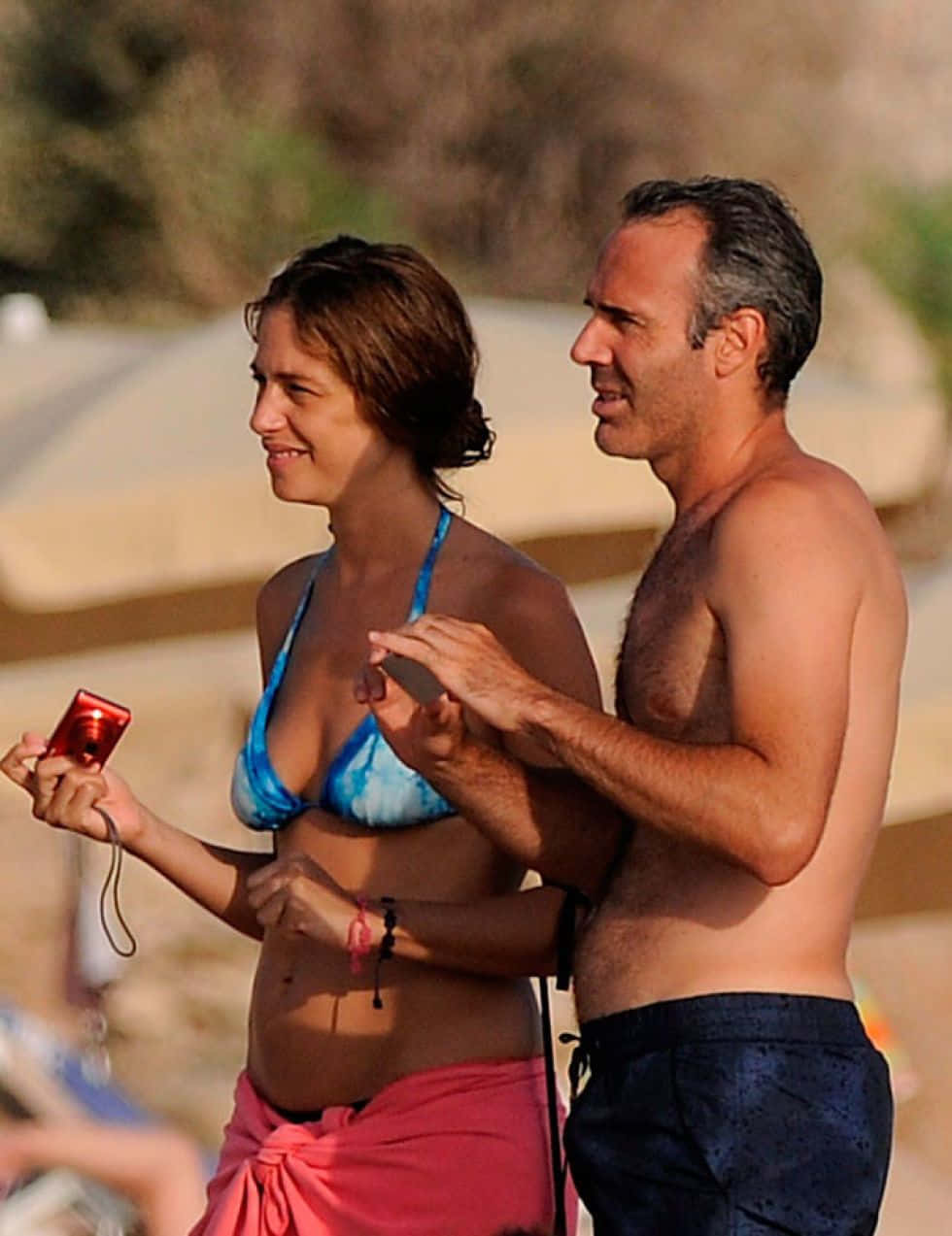 Alex Corretja And Wife Taking Photos