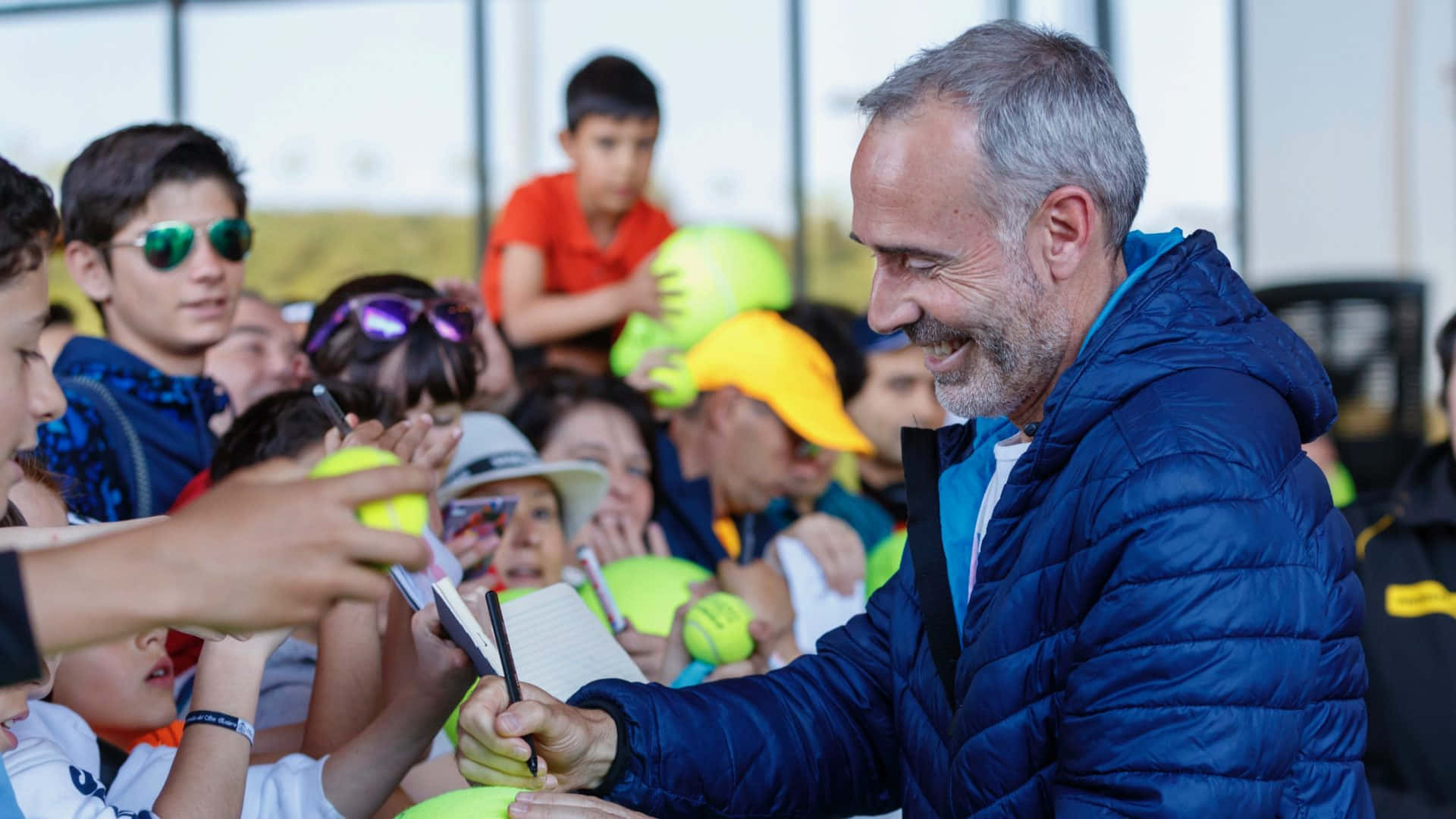 Alex Corretja Signing Autographs For Fans