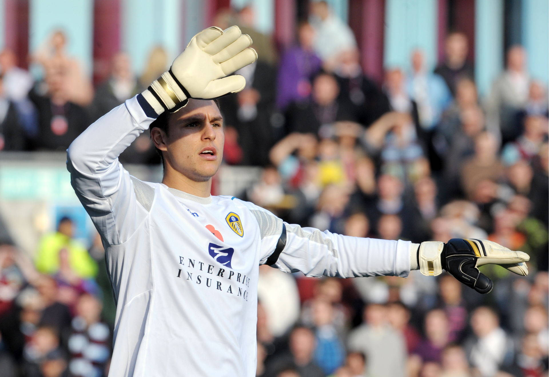 Alex Mccarthy Gesturing With Hands Background