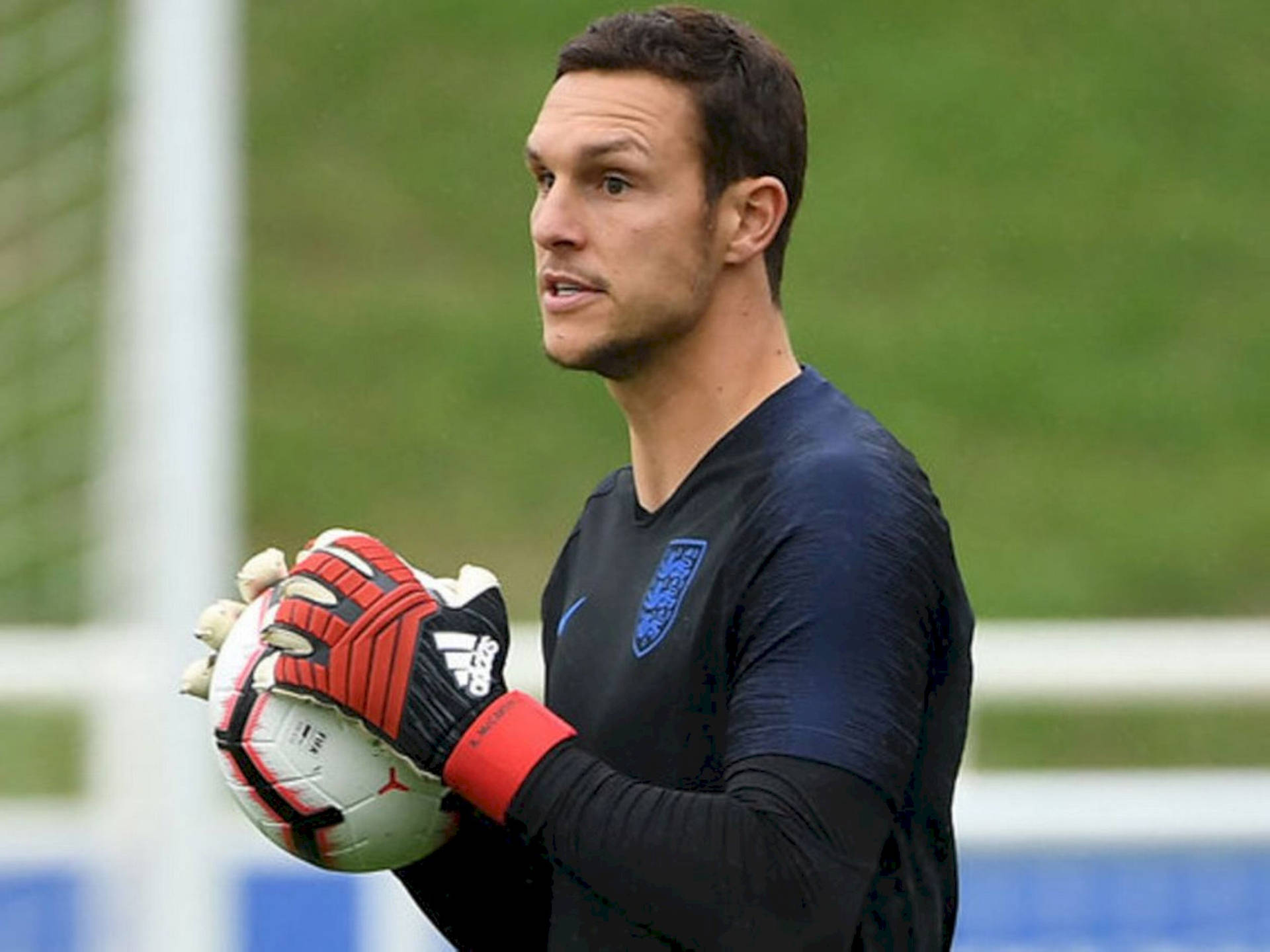 Alex Mccarthy Holding A Soccer Ball