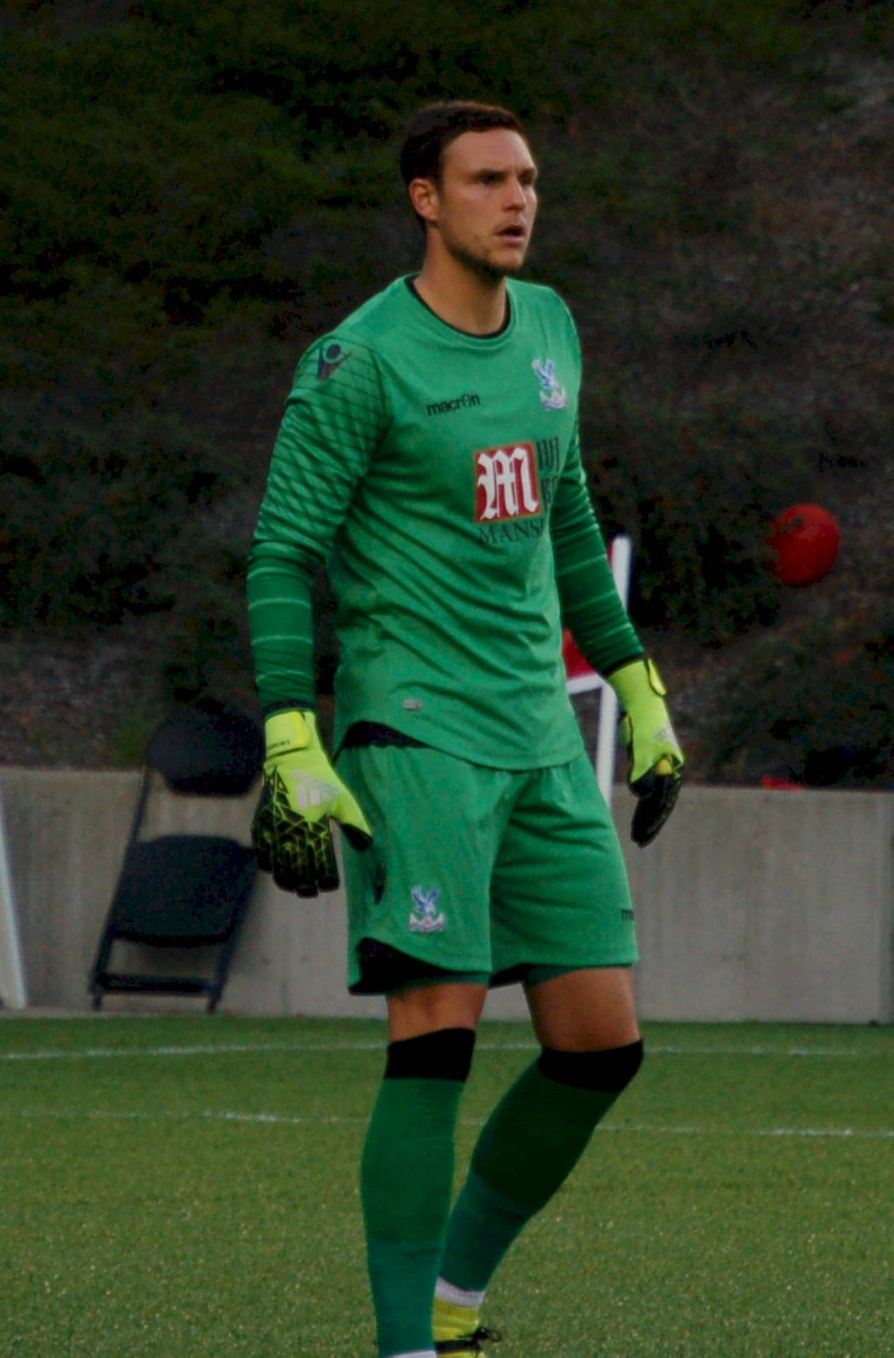 Alex Mccarthy In Green Jersey Background