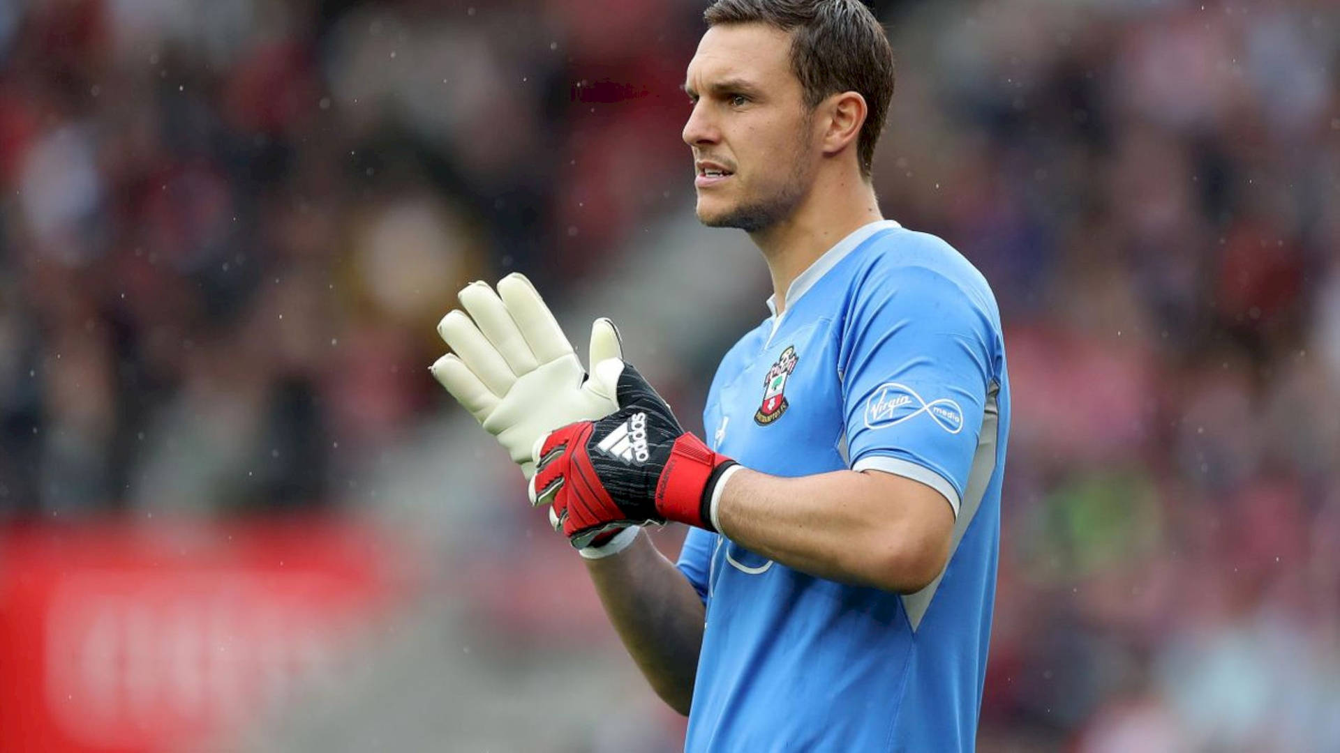 Alex Mccarthy Wearing Gloves Background