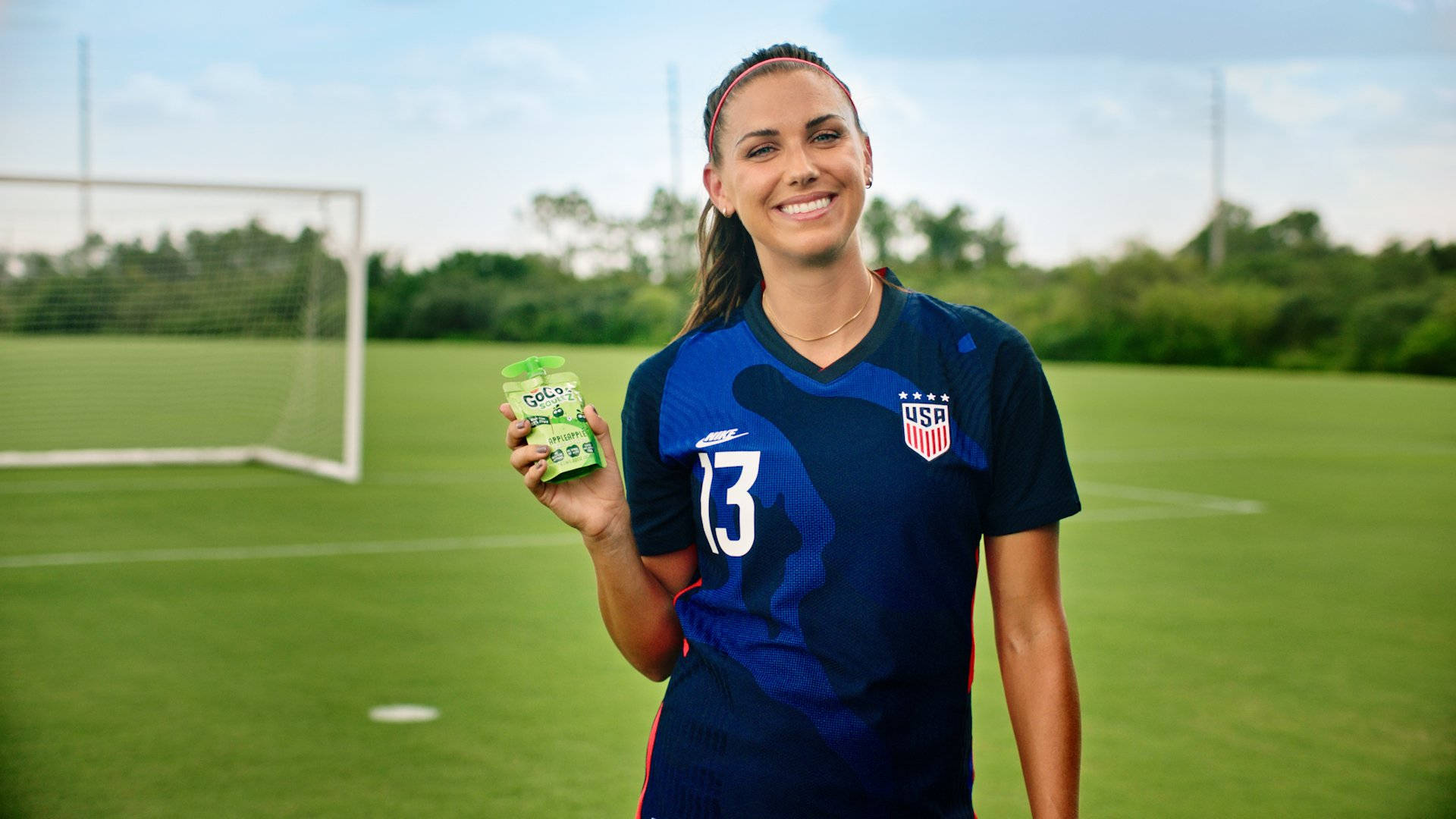 Alex Morgan In Gogo Squeez Ad Background