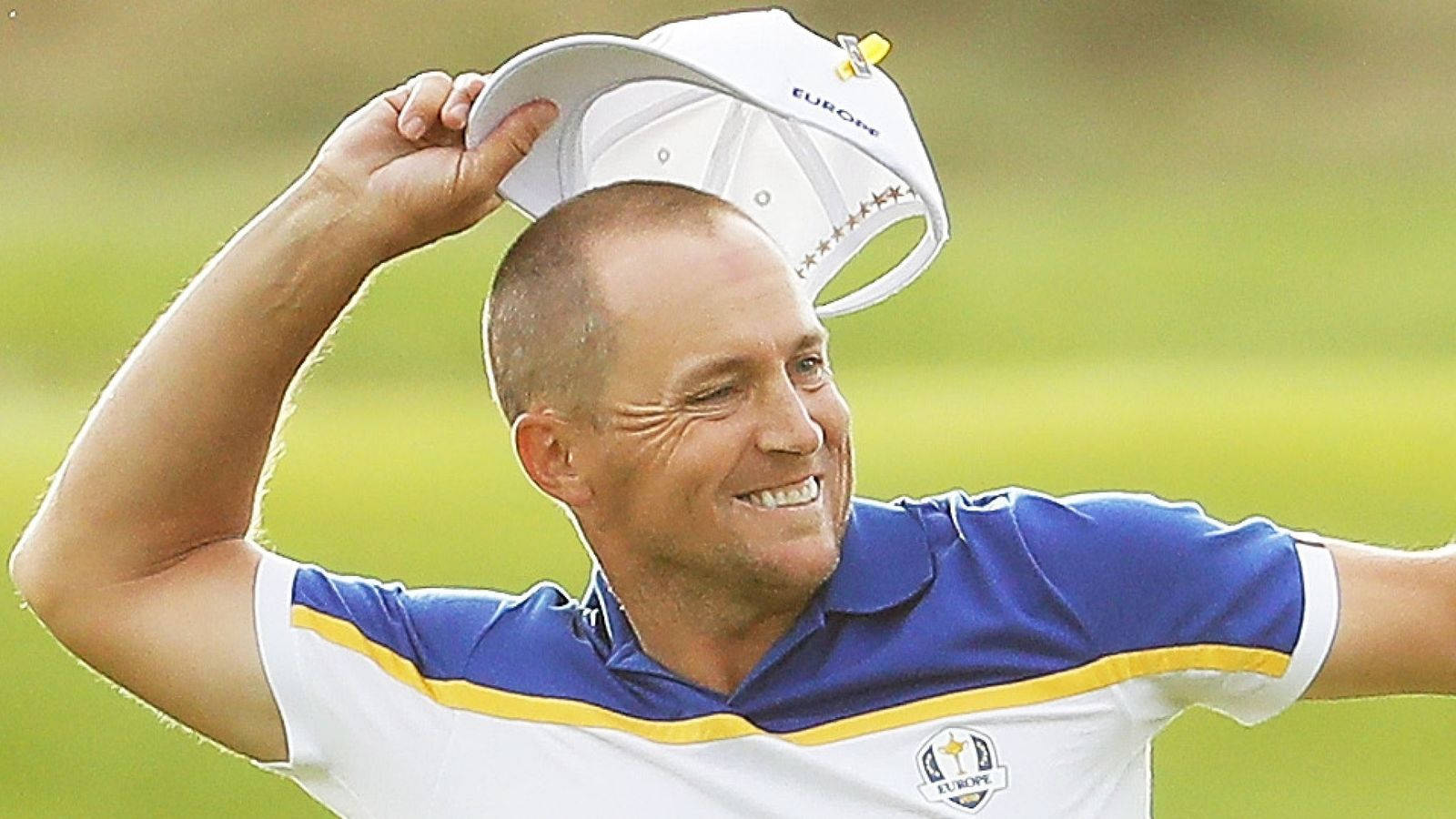 Alex Noren Takes Cap Off Background