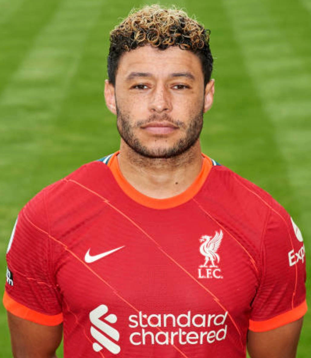 Alex Oxlade-chamberlain Portrait On The Field Background