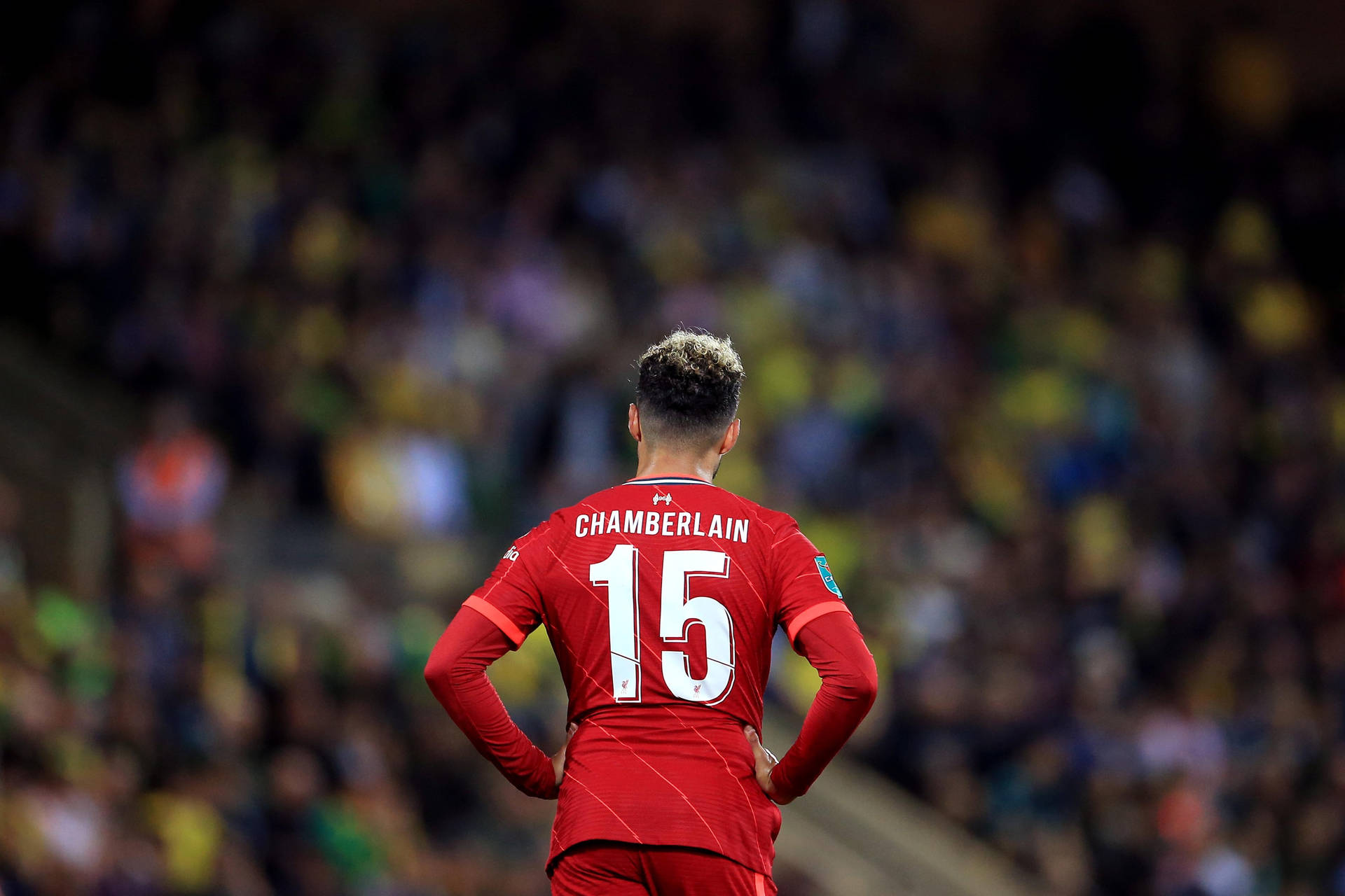 Alex Oxlade-chamberlain, Standing With Hands On Hips Like A True Maestro Of Football Background