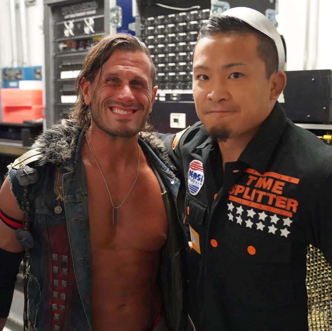 Alex Shelley Along With Yujiro Kushida In Dusty Classic Tournament Background