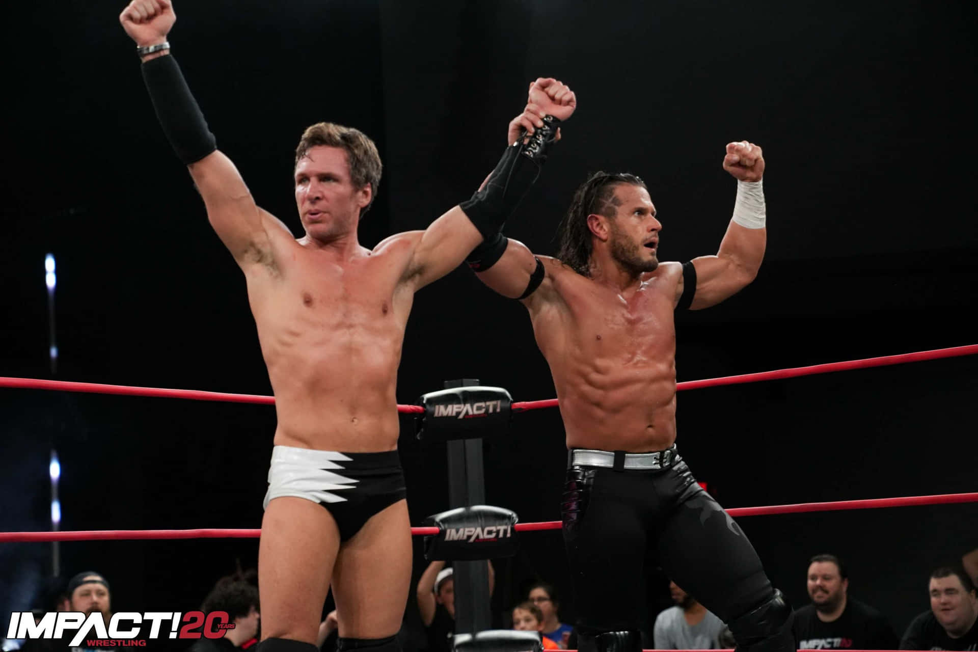 Alex Shelley And Chris Sabin In A Moment From Impact Wrestling Background