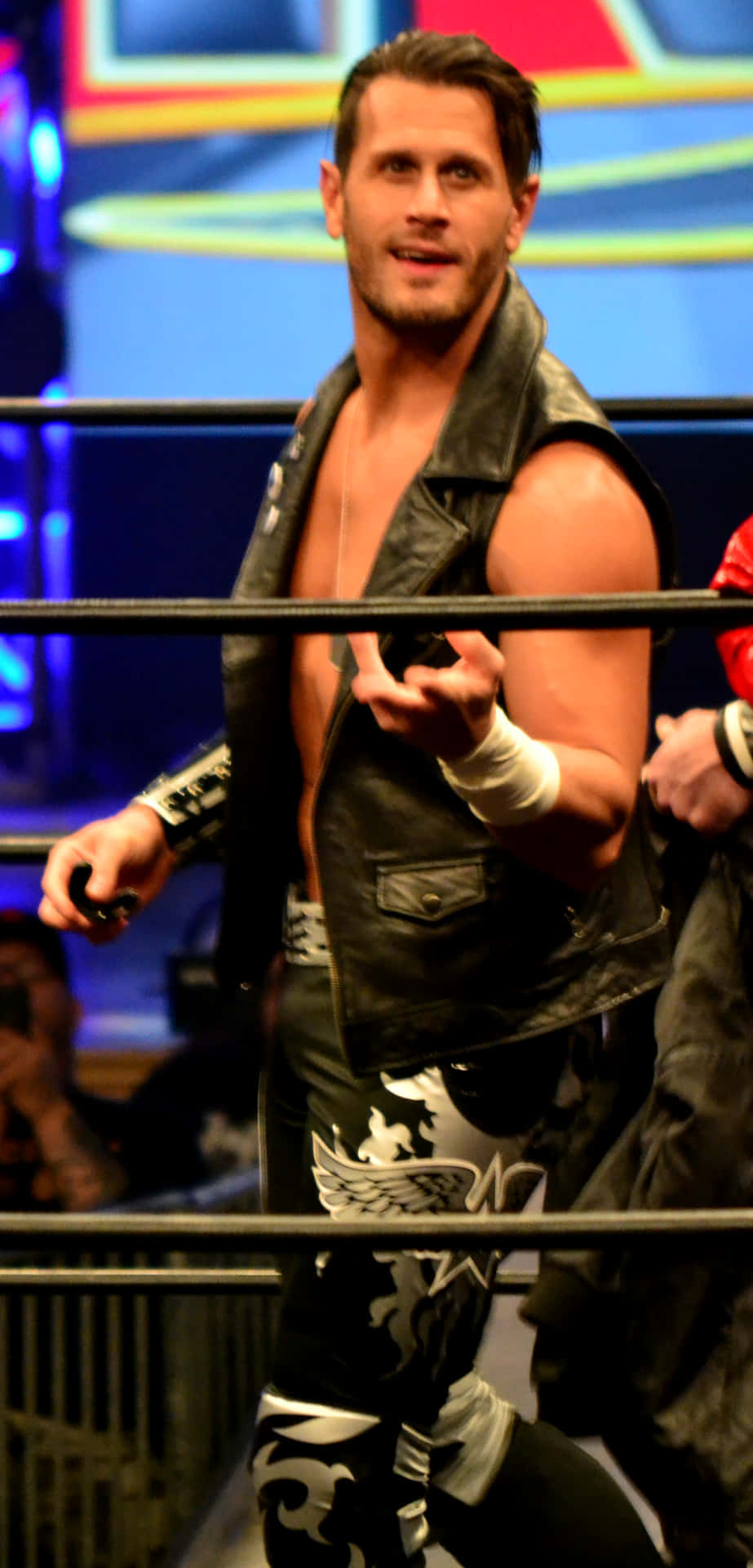 Alex Shelley Inside Ring During Wrestling Match Background