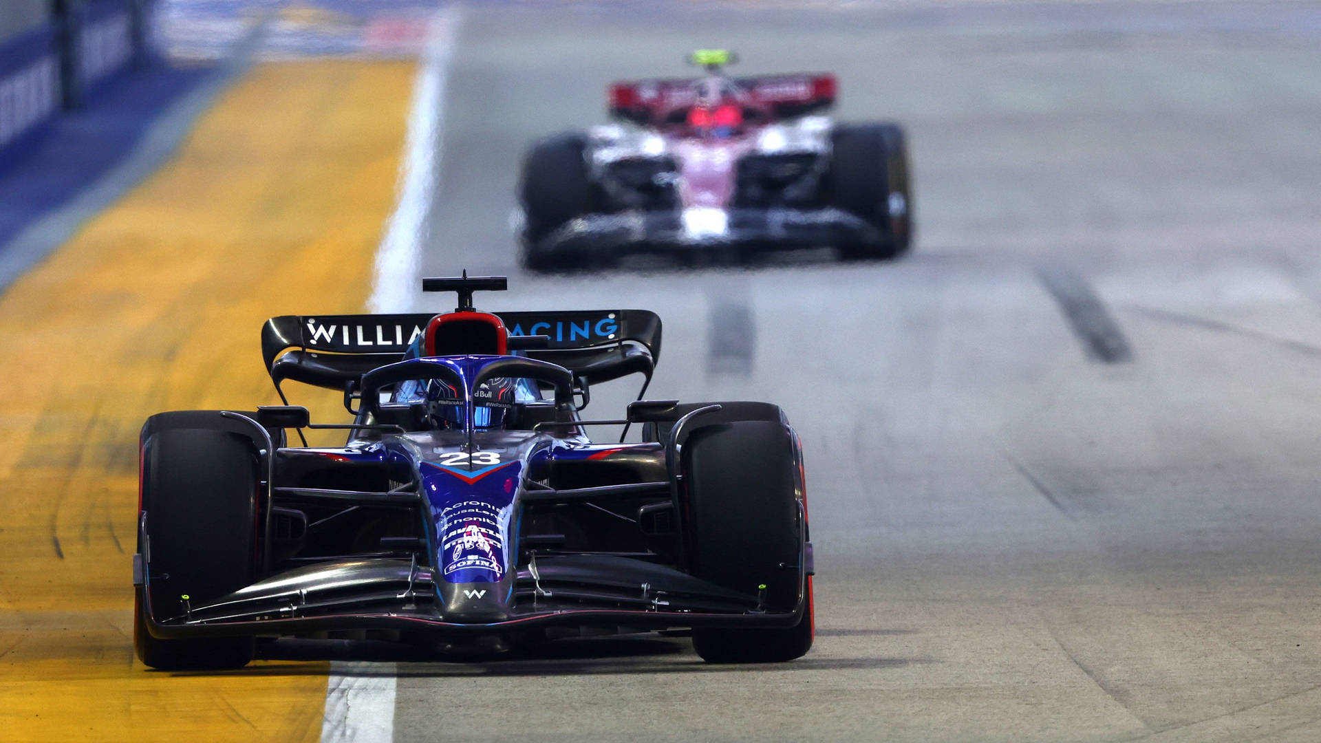 Alexander Albon Car On Race Track Background