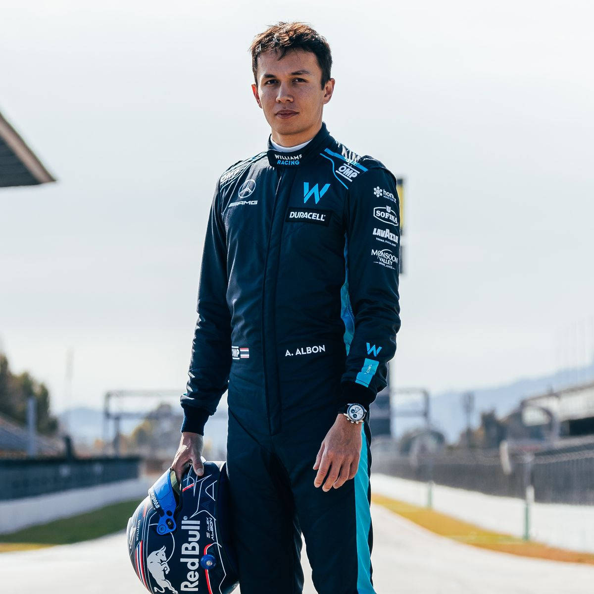 Alexander Albon In Blue Race Suit Background