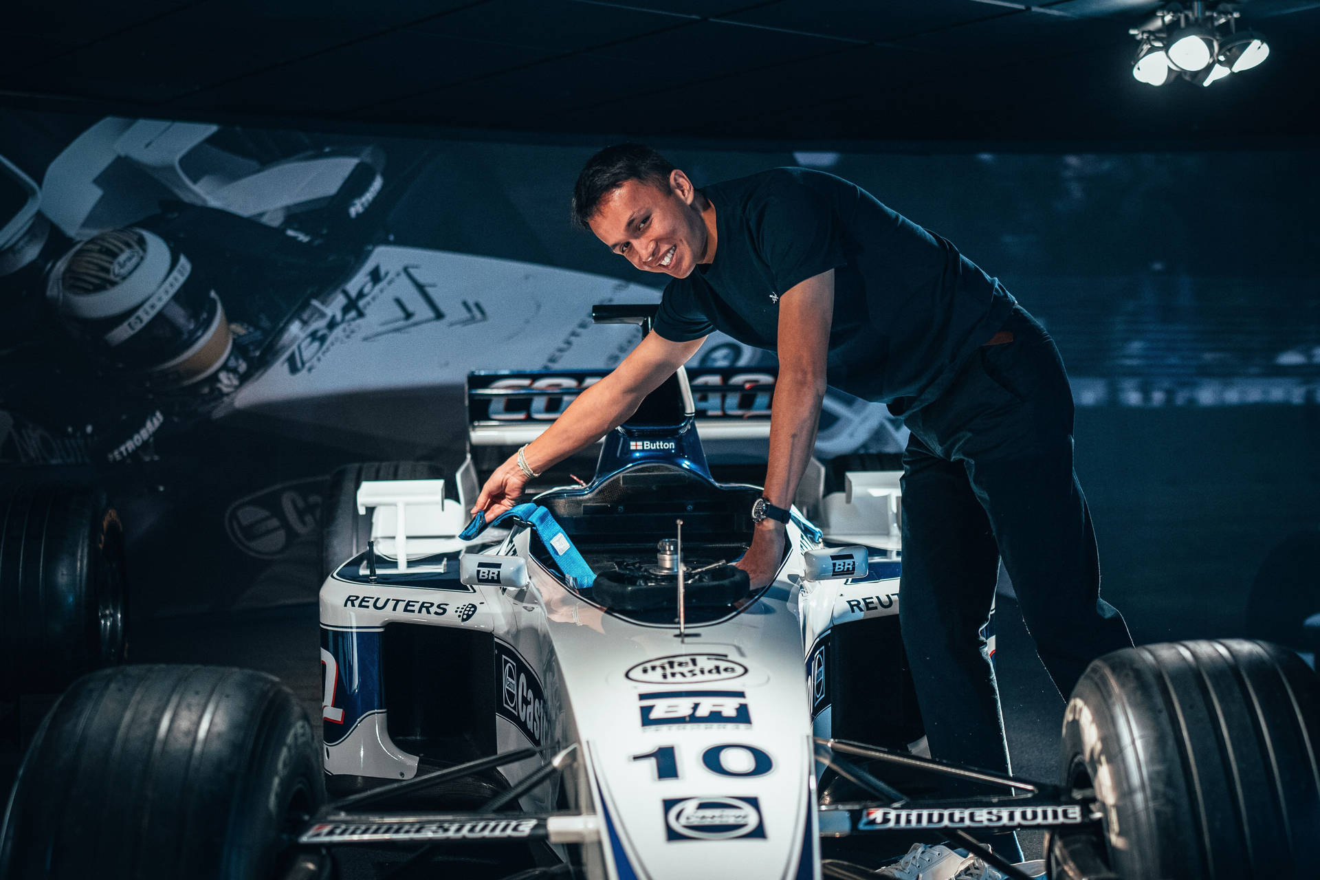 Alexander Albon Leaning Over Car