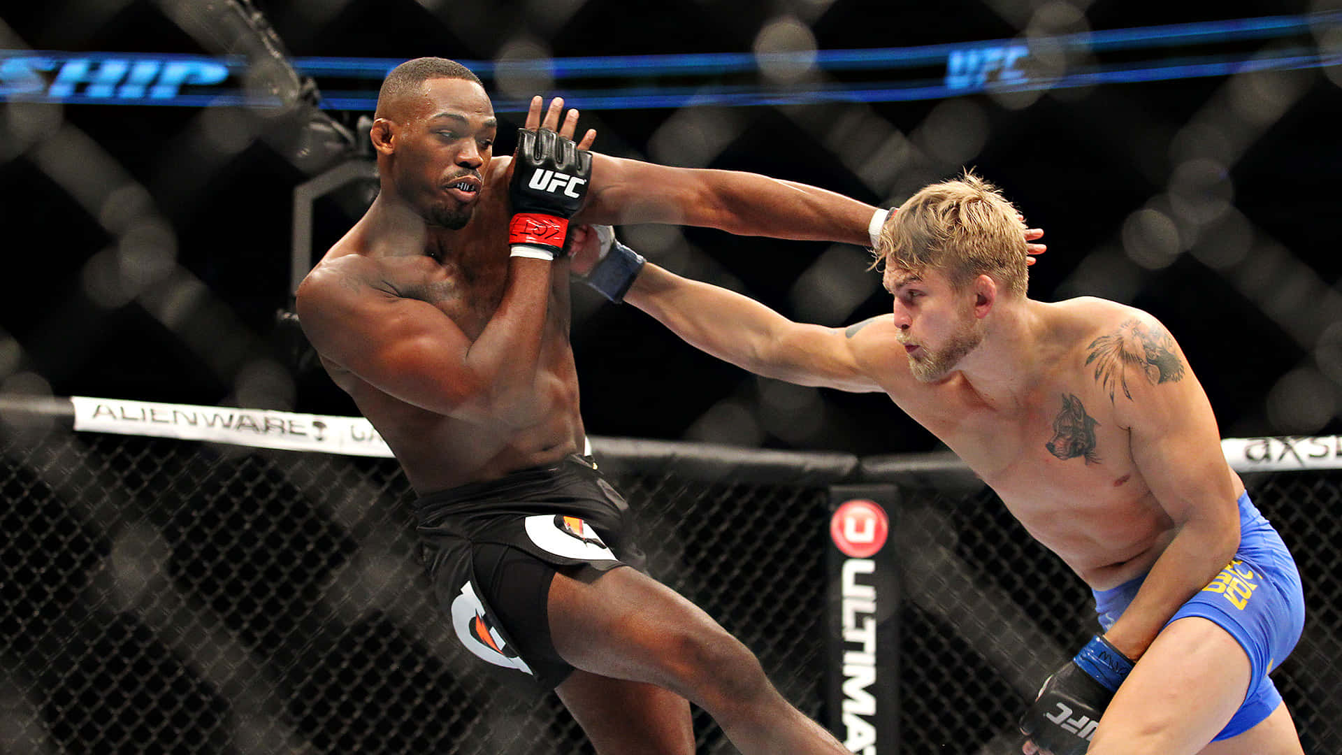 Alexander Gustafsson Delivering Powerful Punch To Jon Jones In Ufc Bout Background