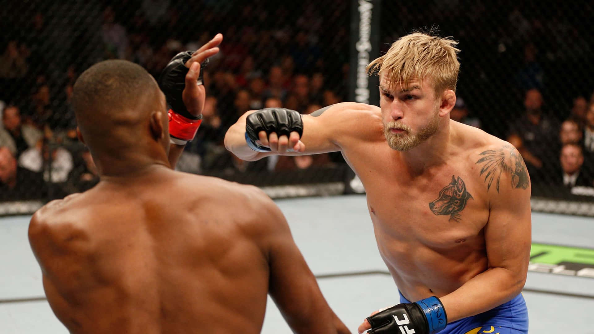 Alexander Gustafsson Throws A Powerful Right Hand At Jon Jones During Their Ufc Bout Background