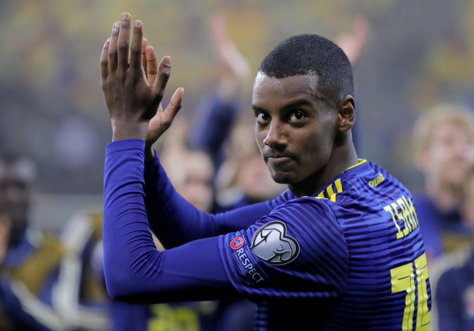 Alexander Isak Clapping Up Close Background