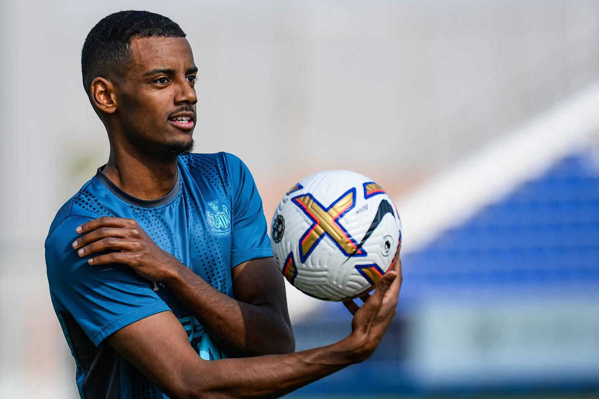 Alexander Isak Holding A Ball