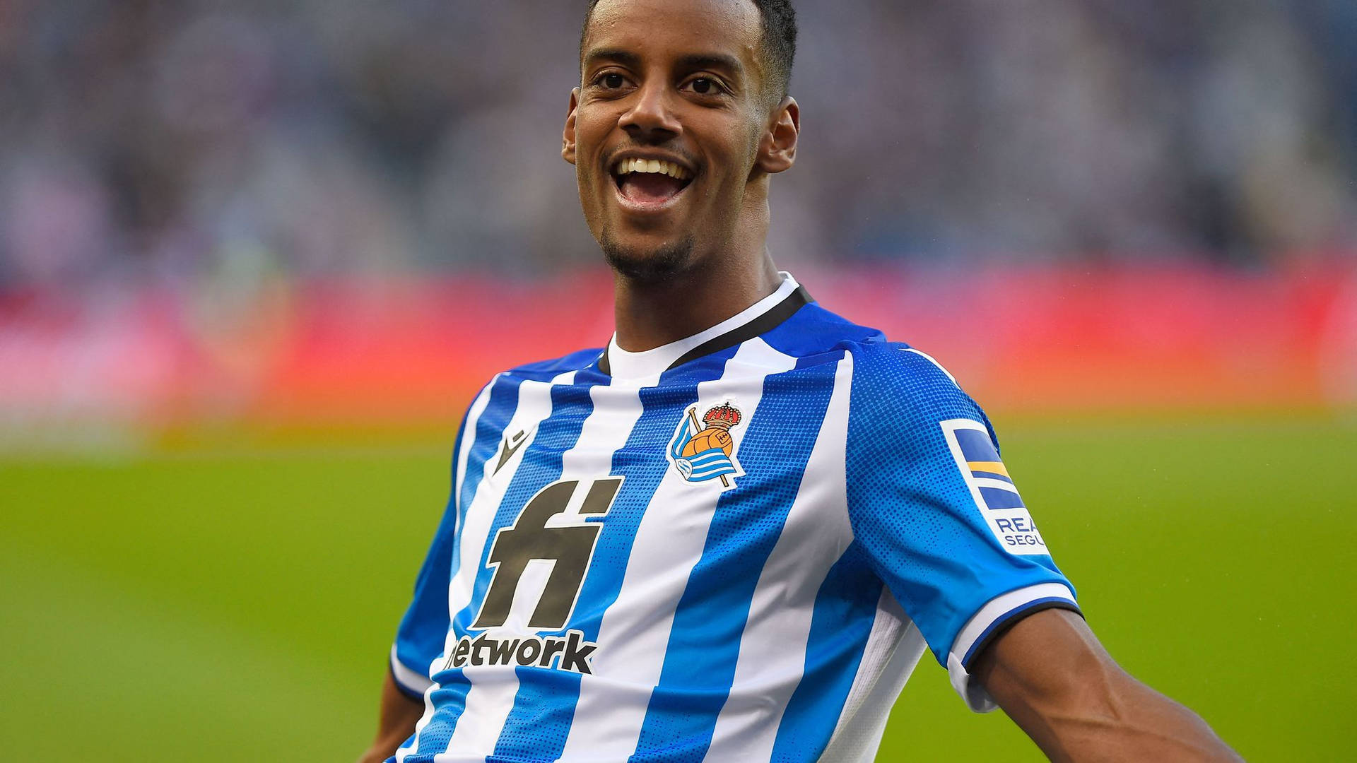 Alexander Isak In Striped Jersey Background